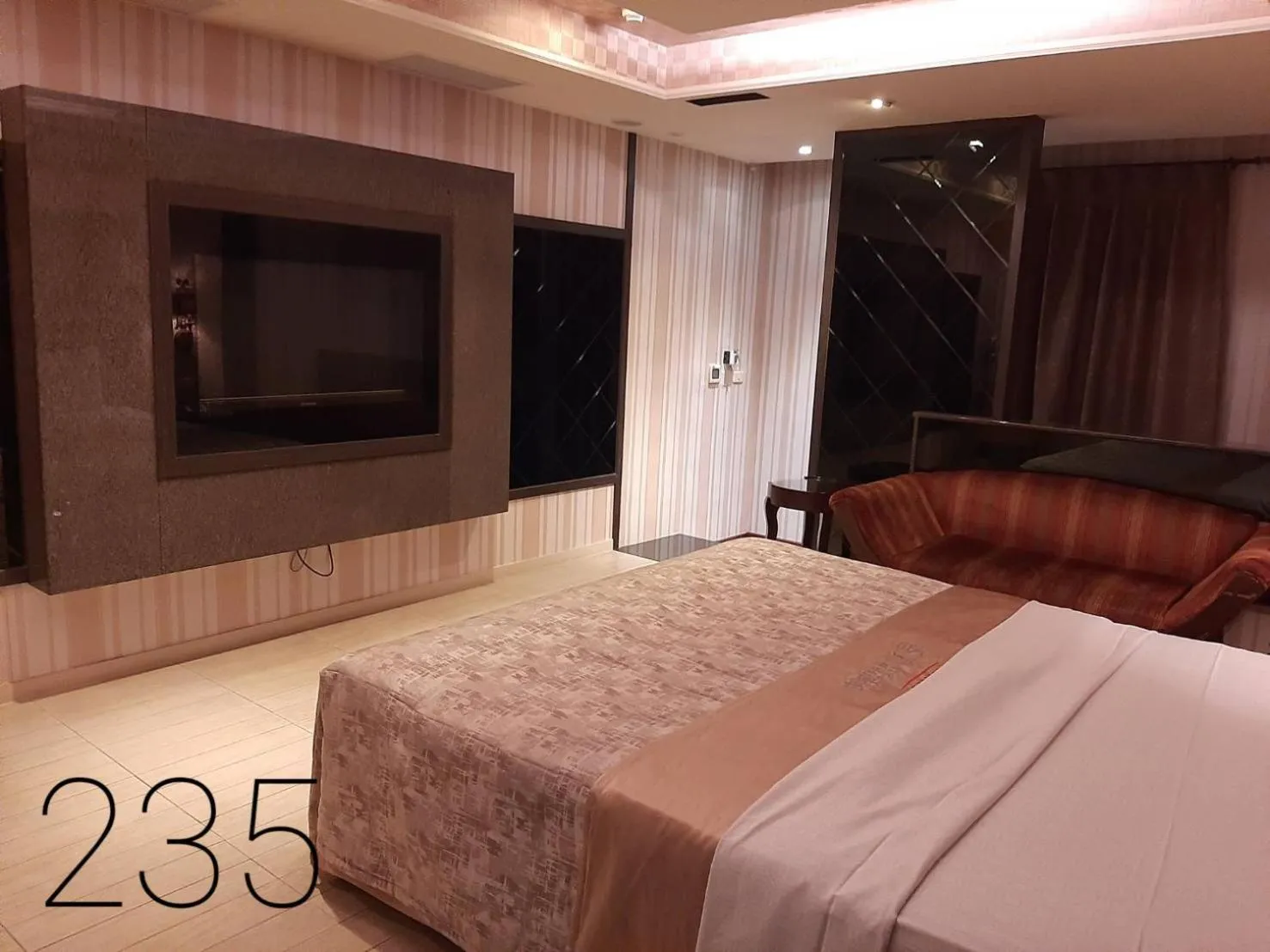 Bed in Chateau Motel & Spa (Daliao)