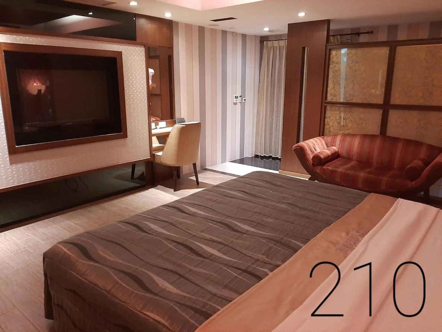 Bed in Chateau Motel & Spa (Daliao)