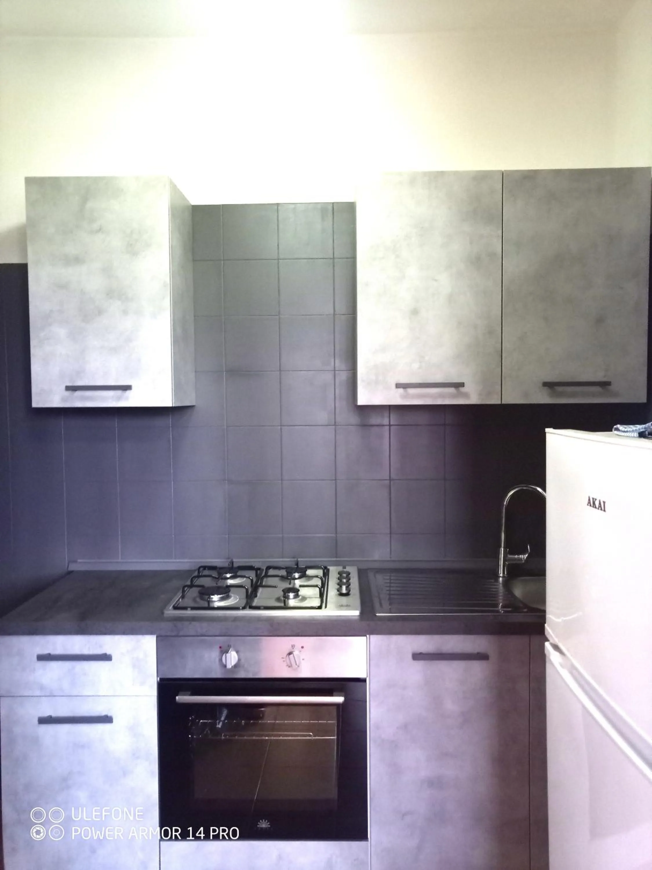 Communal kitchen in Stanza in Villa con giardino vista mare