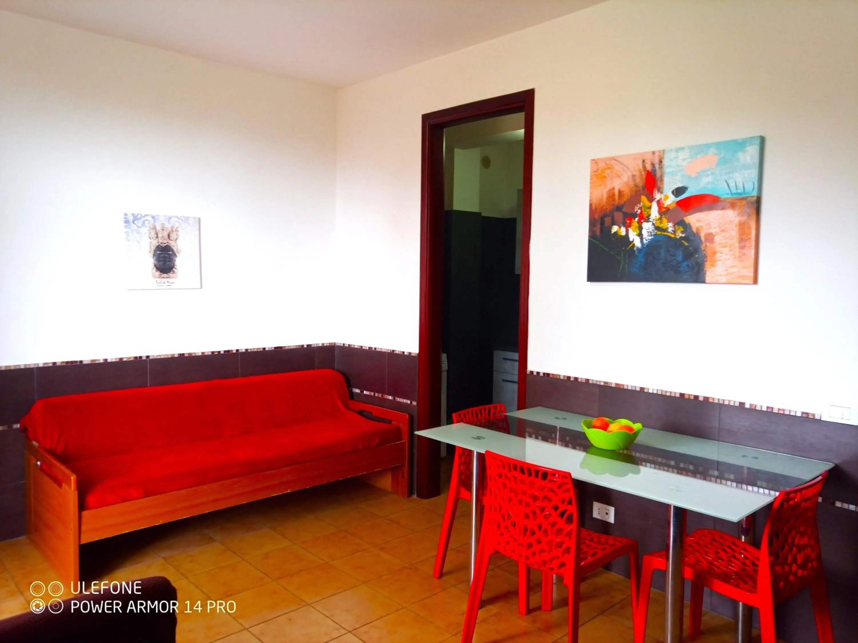 Communal lounge/ TV room in Stanza in Villa con giardino vista mare