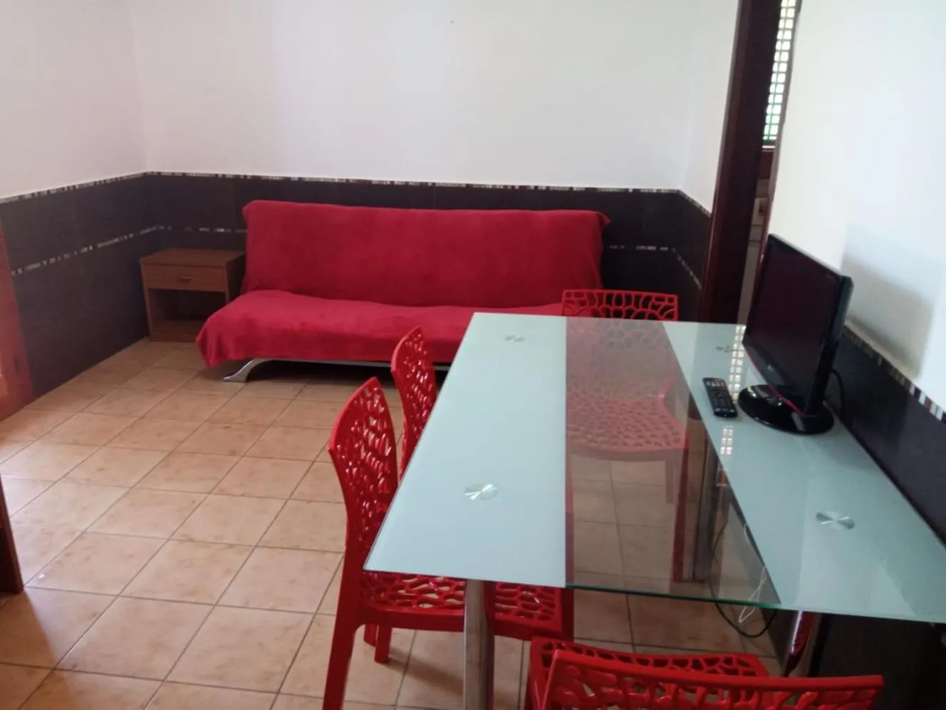 TV and multimedia in Stanza in Villa con giardino vista mare