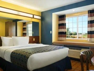 Bed in Microtel Inn & Suites