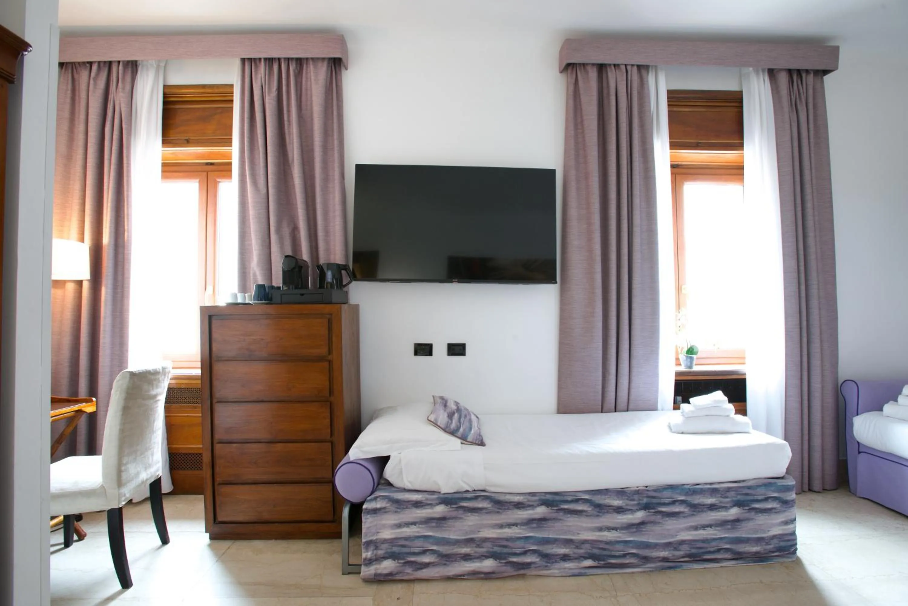 Bed in St. Peter' Six Rooms & Suites