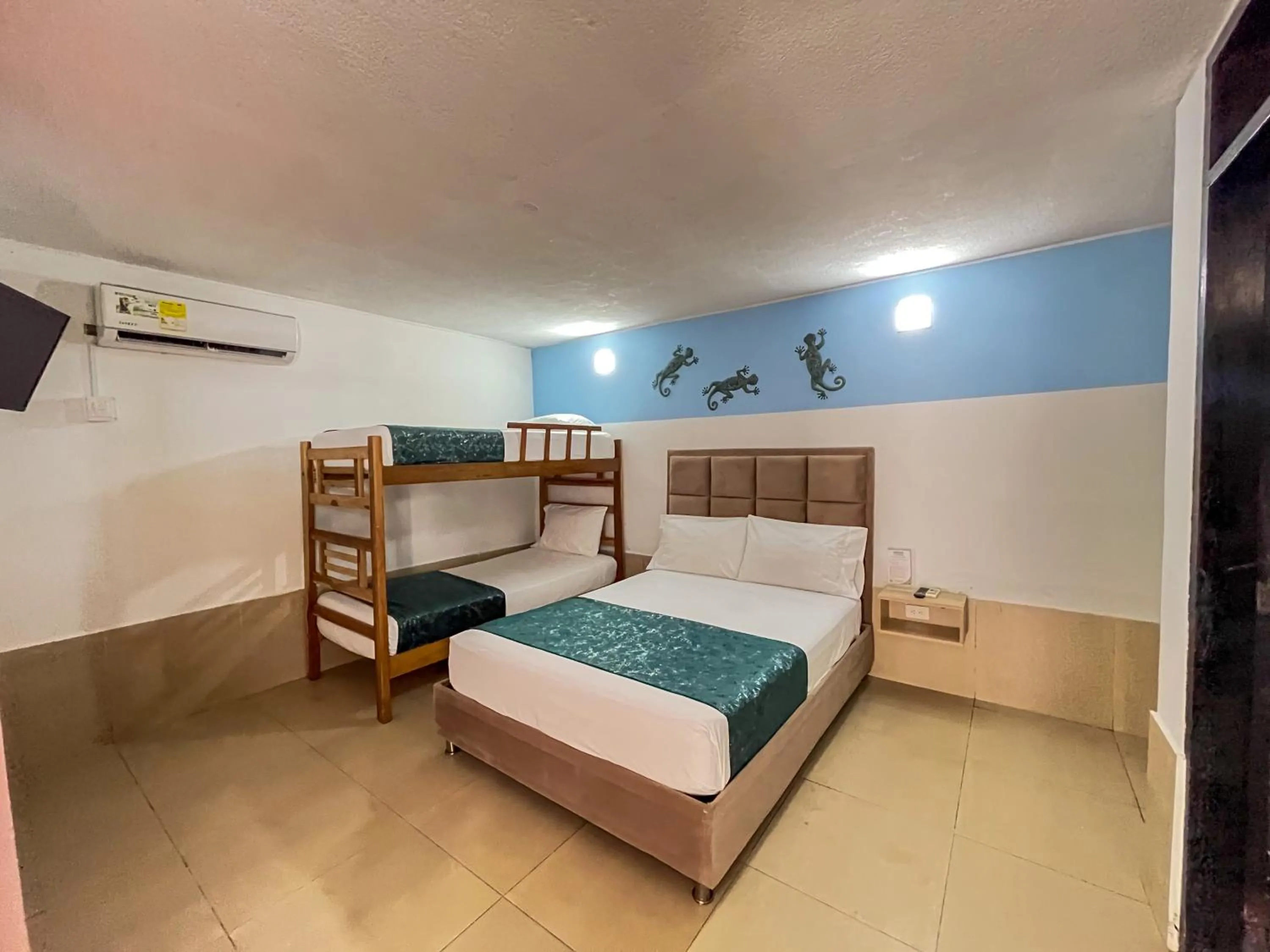 air conditioner, Bed in Hotel Los Veleros Santa Marta