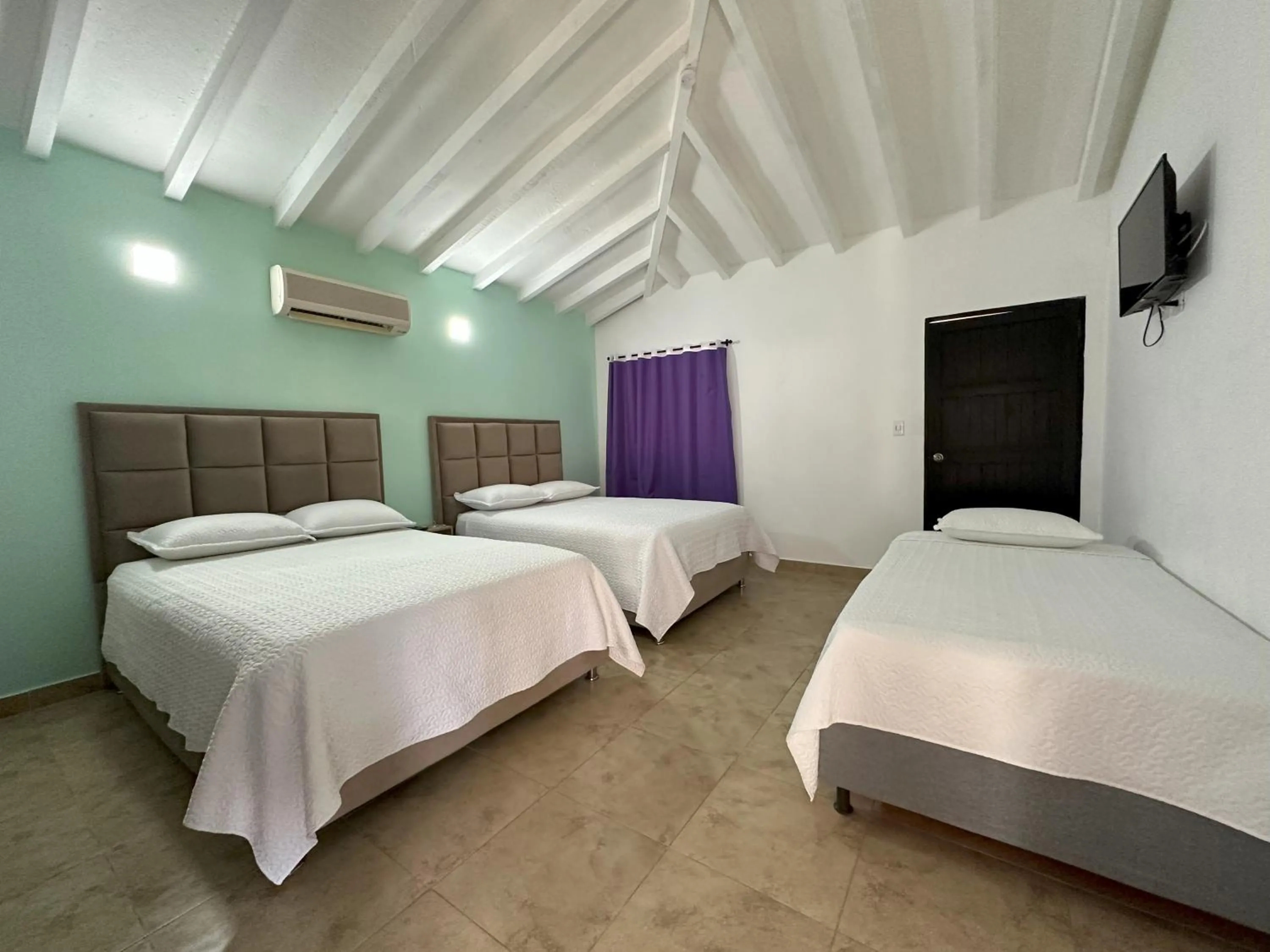 Photo of the whole room, Bed in Hotel Los Veleros Santa Marta