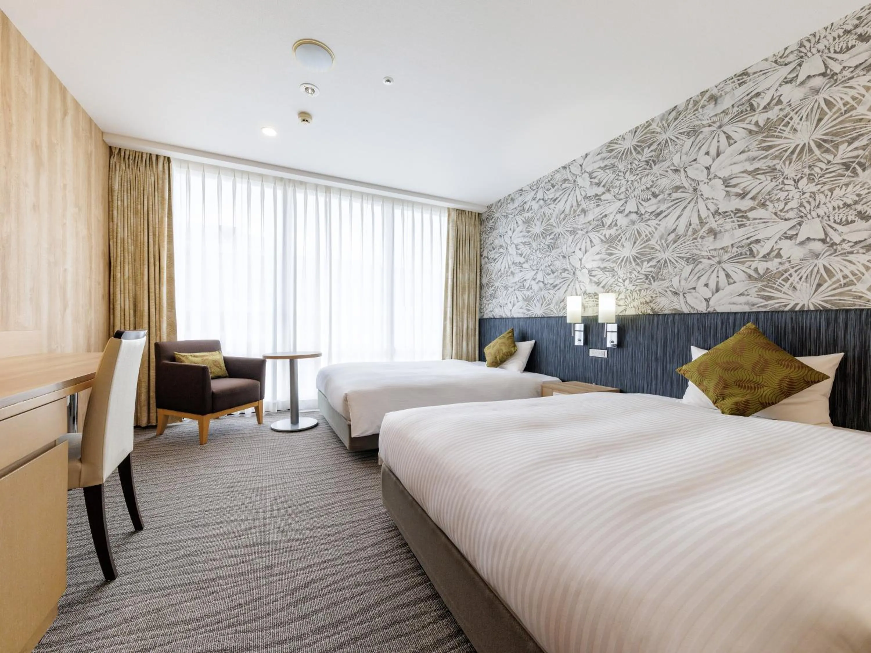 Bed in Nishitetsu Resort Inn Naha