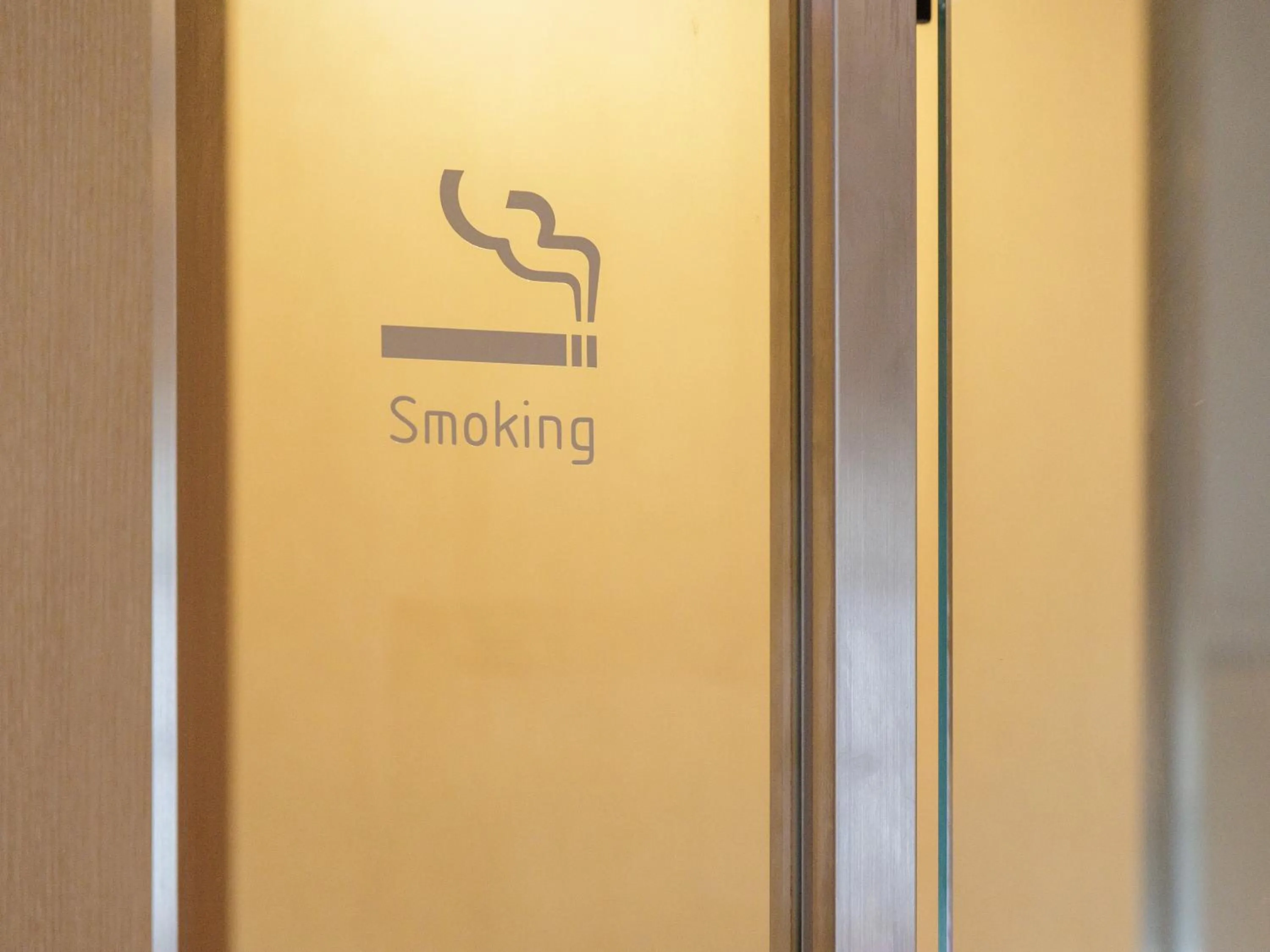 Communal lounge/ TV room in Nishitetsu Resort Inn Naha