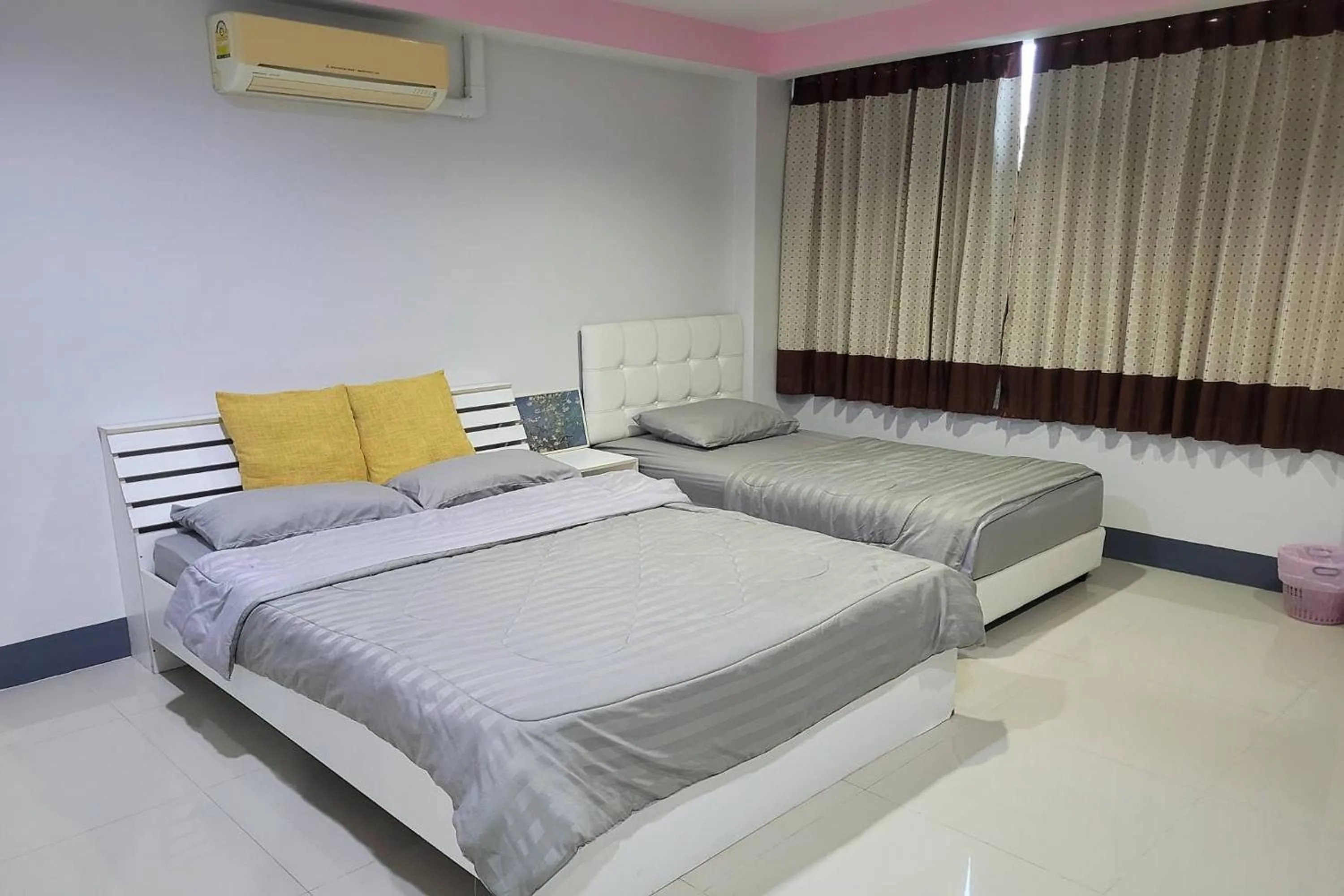 Bed in Kaewchantra Mansion