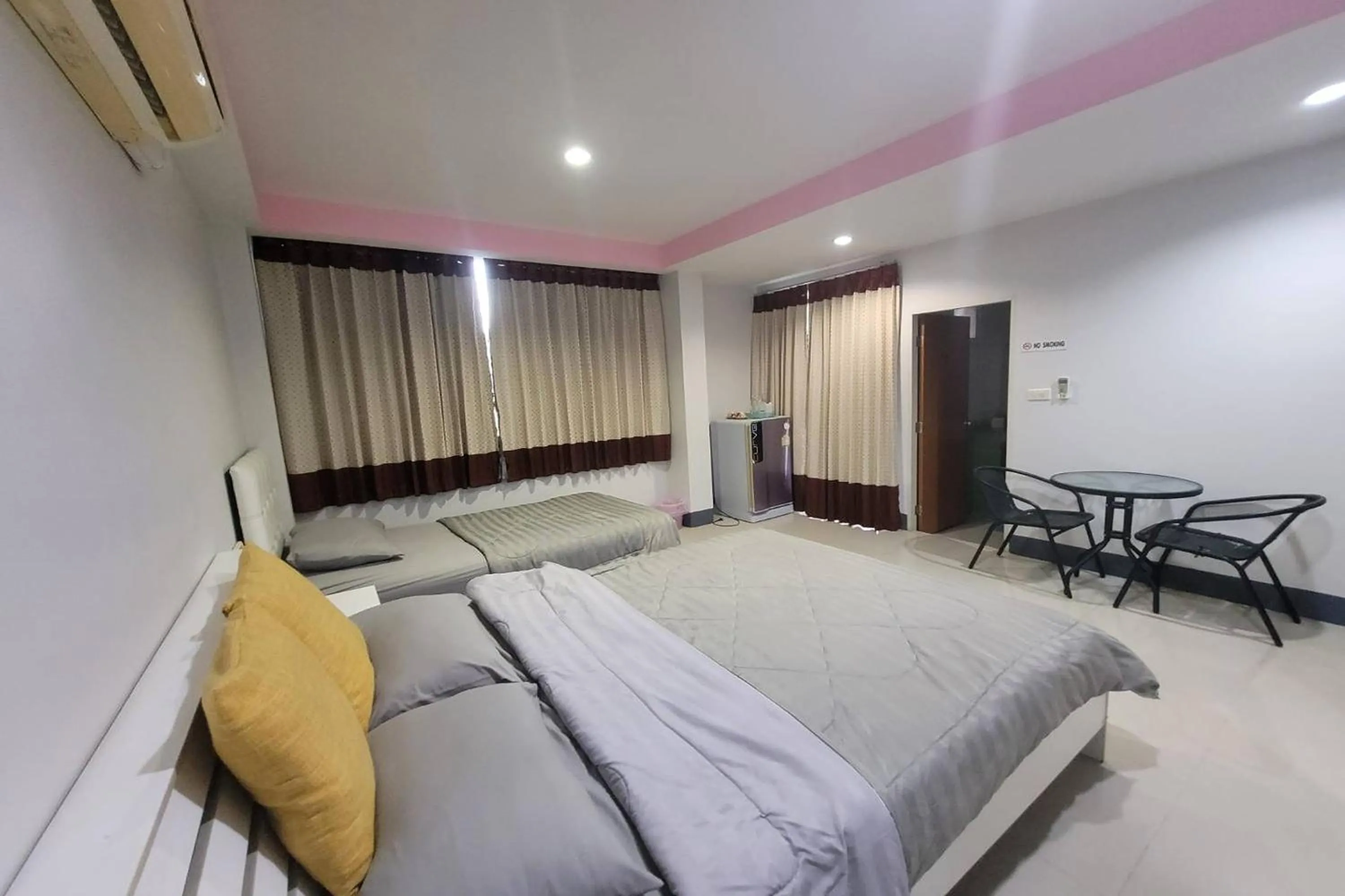 Bed in Kaewchantra Mansion