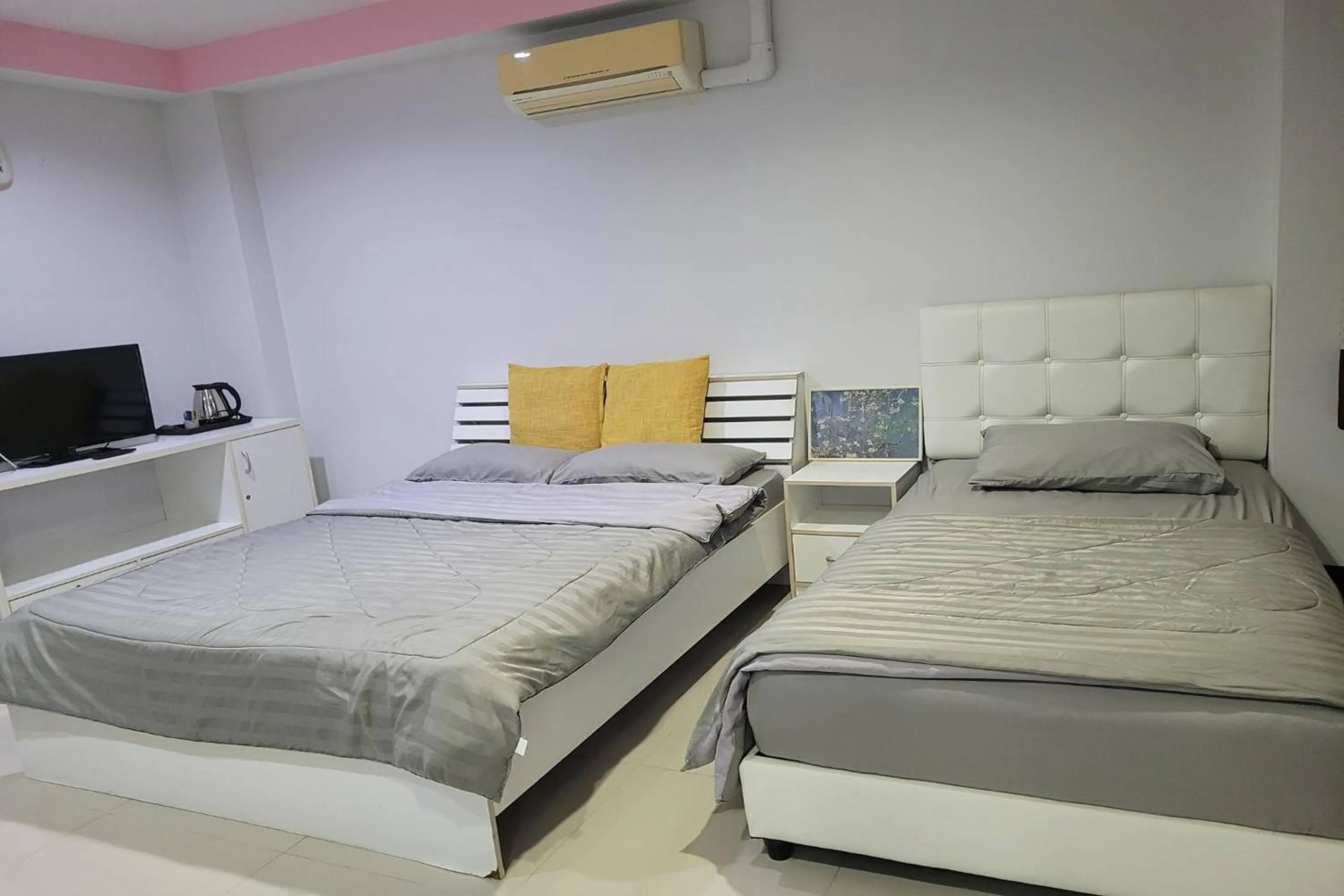 Bed in Kaewchantra Mansion