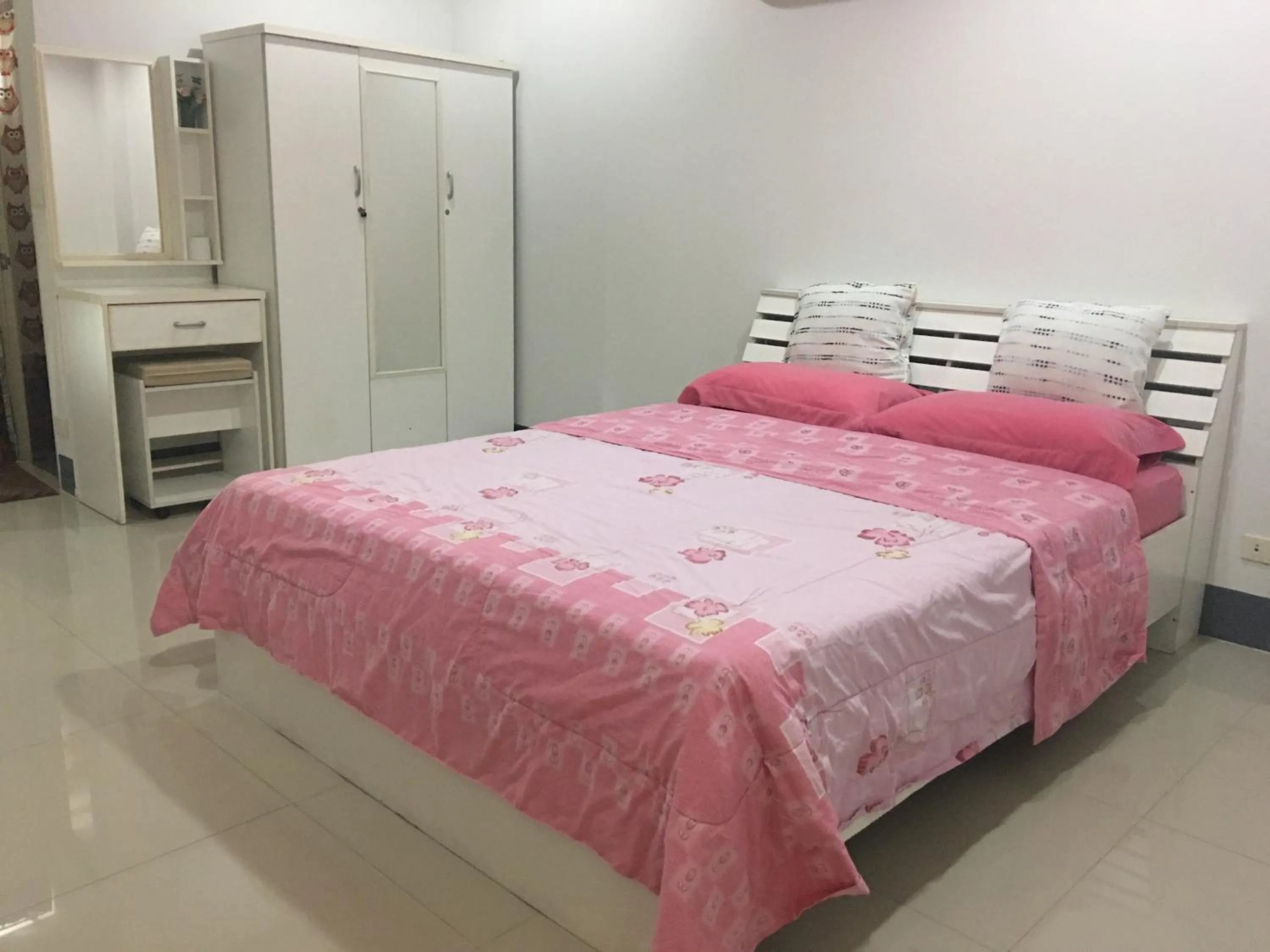 Bed in Kaewchantra Mansion