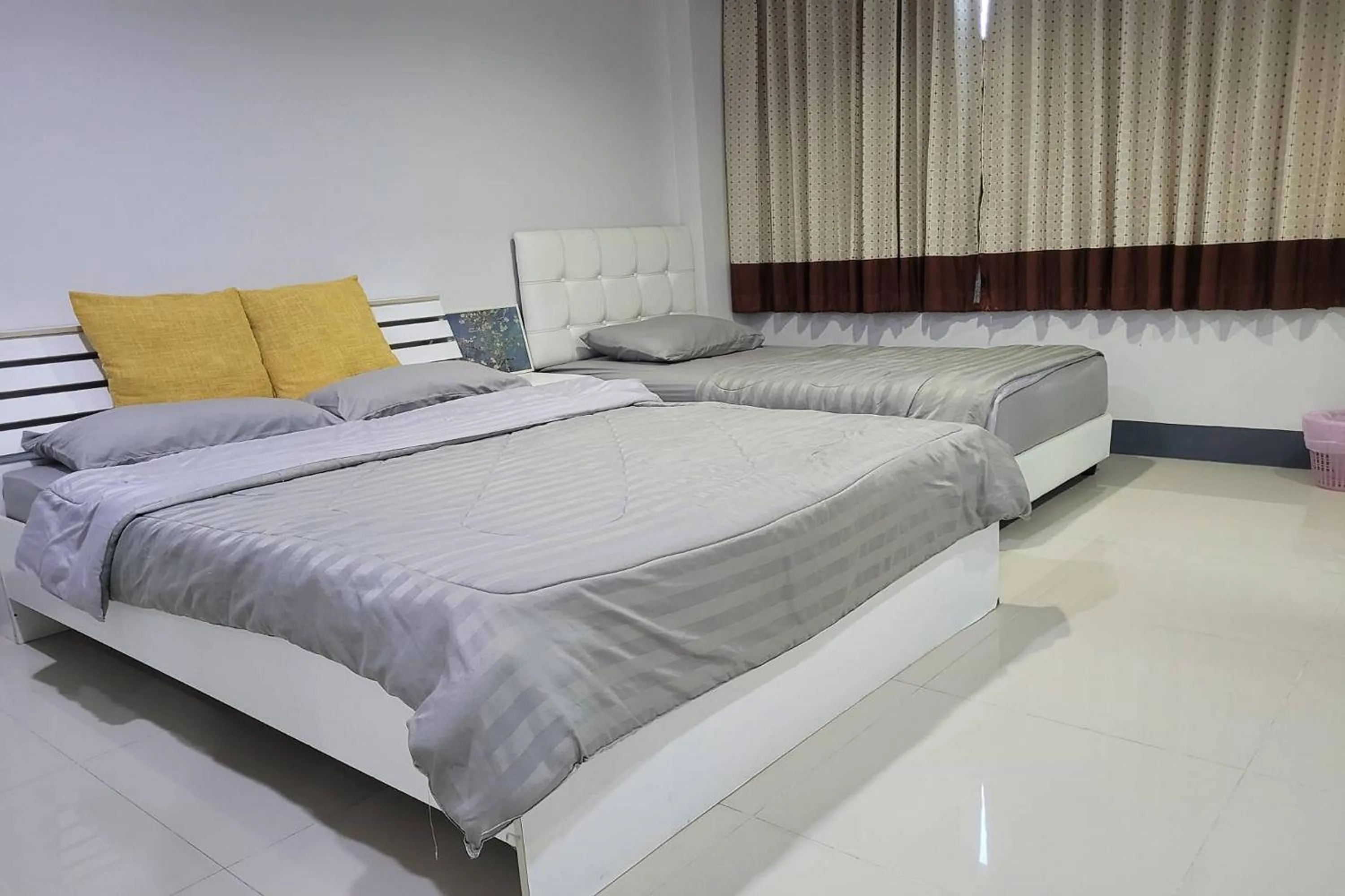 Bed in Kaewchantra Mansion