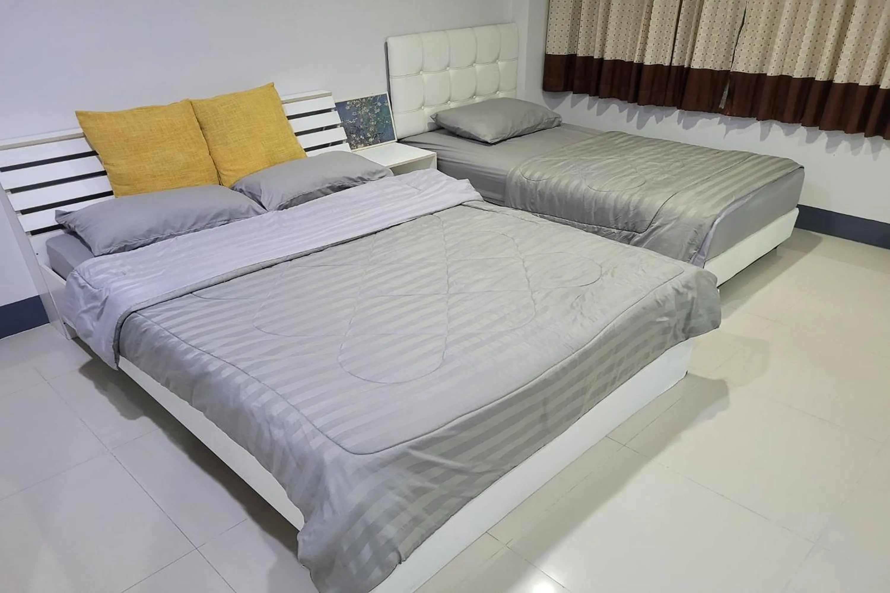 Bed in Kaewchantra Mansion