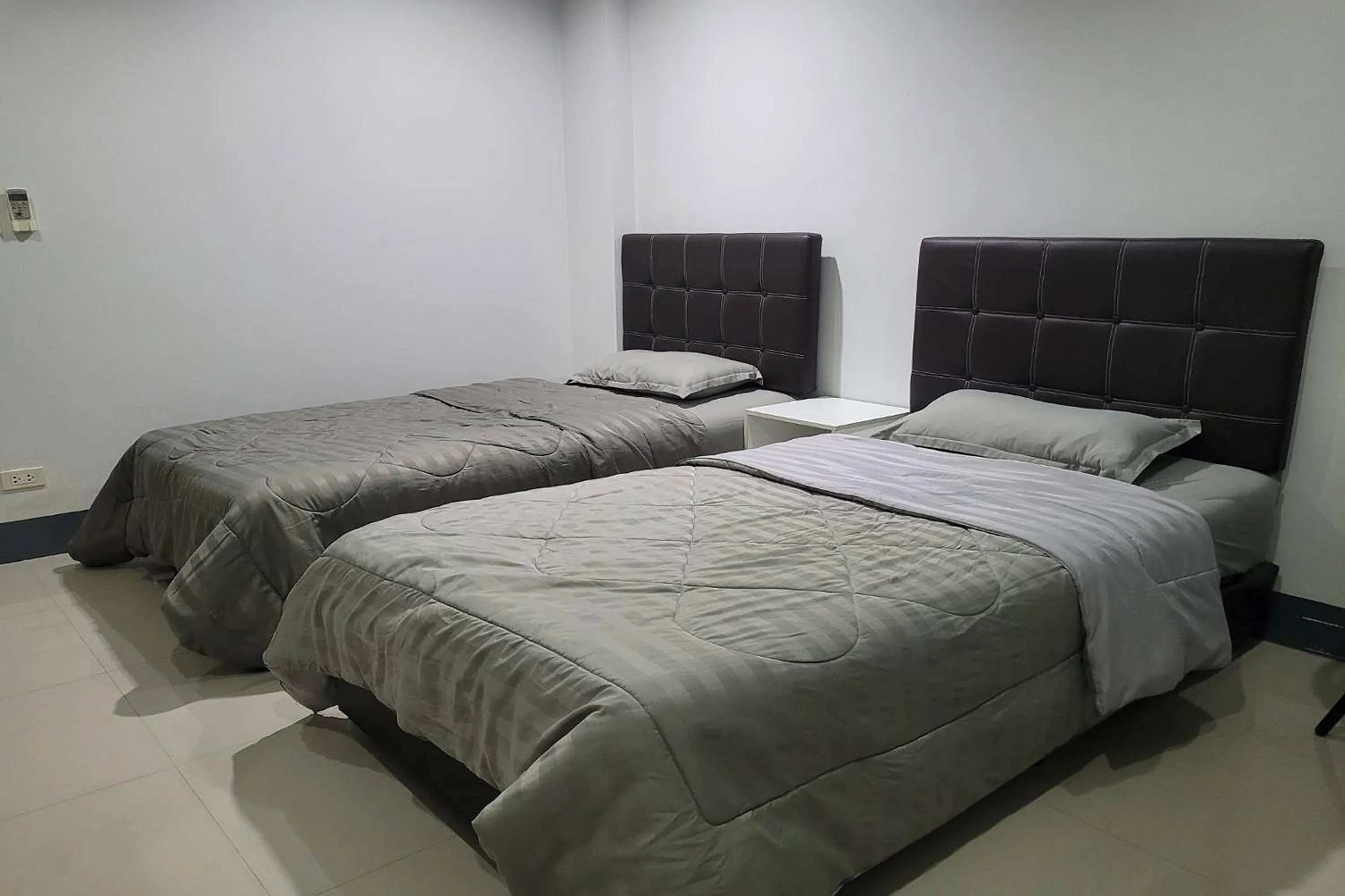 Bed in Kaewchantra Mansion