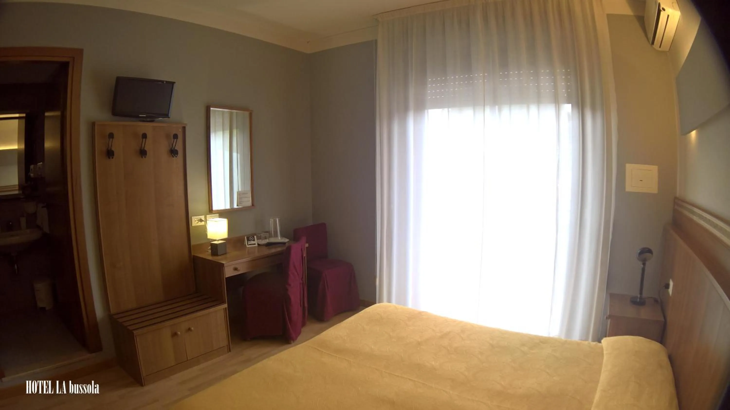 Bed in Hotel La Bussola