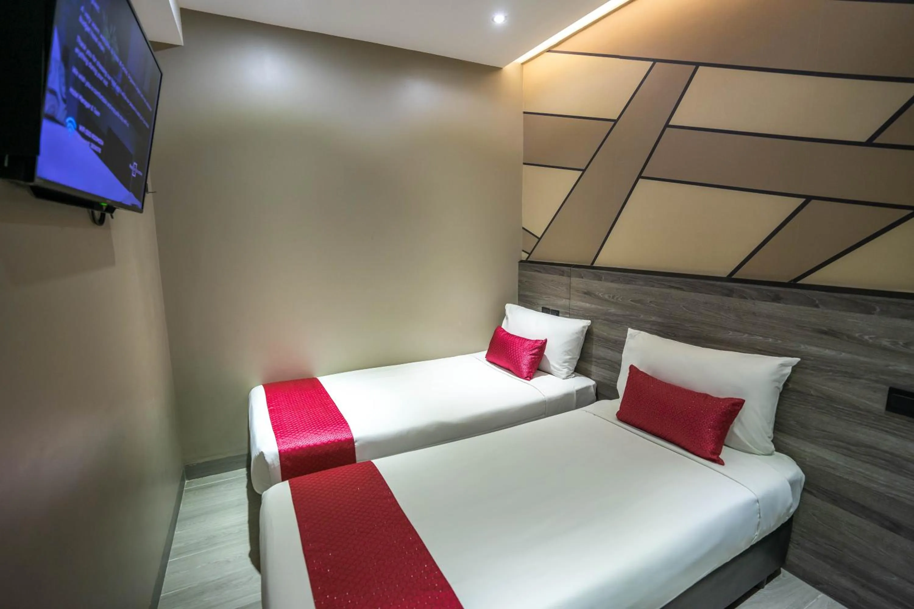 Bed in Hotel 81 Orchid