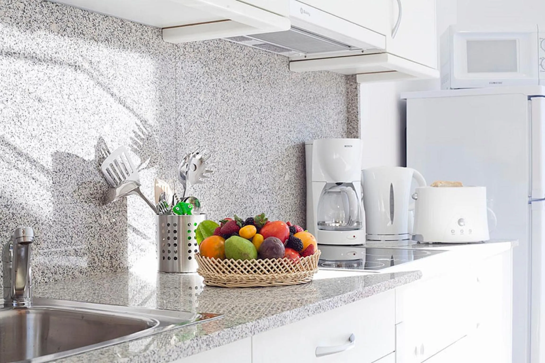 Kitchen or kitchenette in Charmsuites Nou Rambla