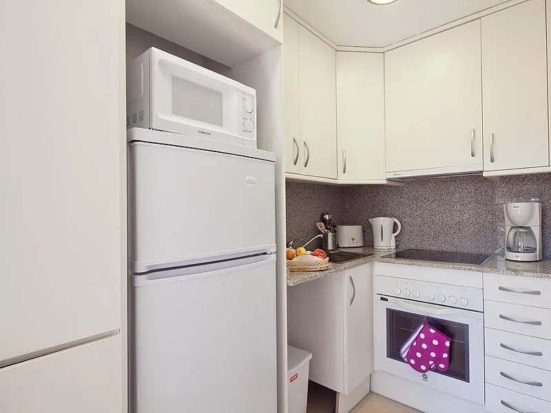 Kitchen or kitchenette in Charmsuites Nou Rambla
