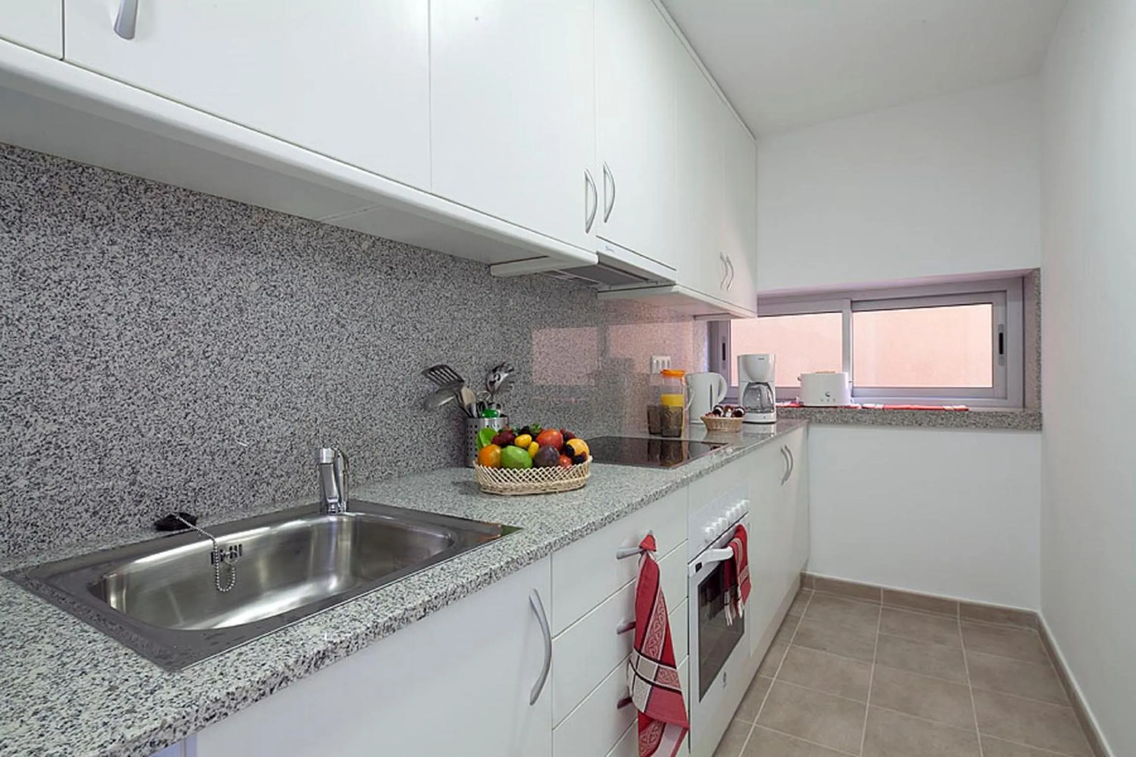 Kitchen or kitchenette in Charmsuites Nou Rambla