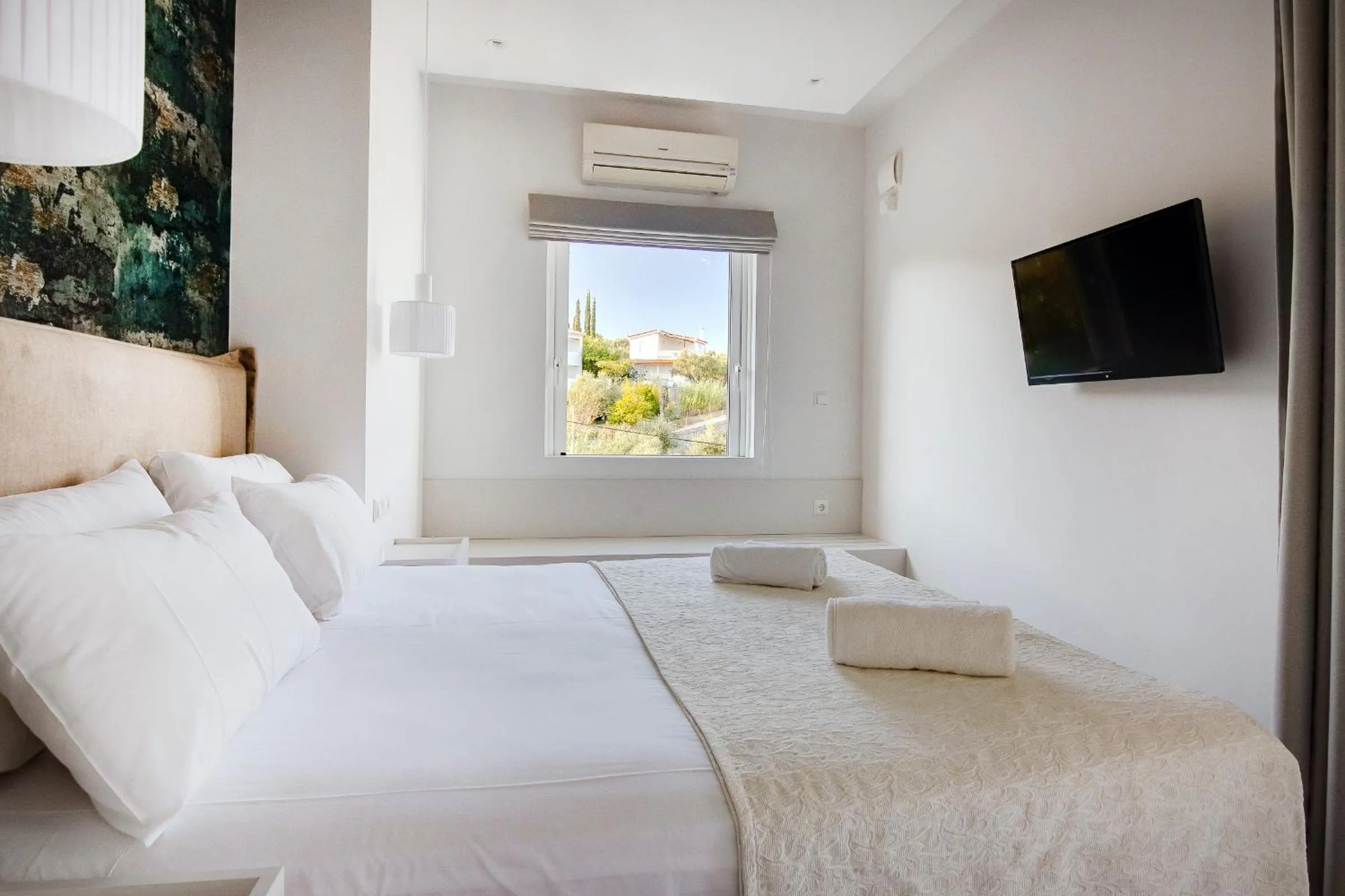 Bed in Peroulia Beach Houses