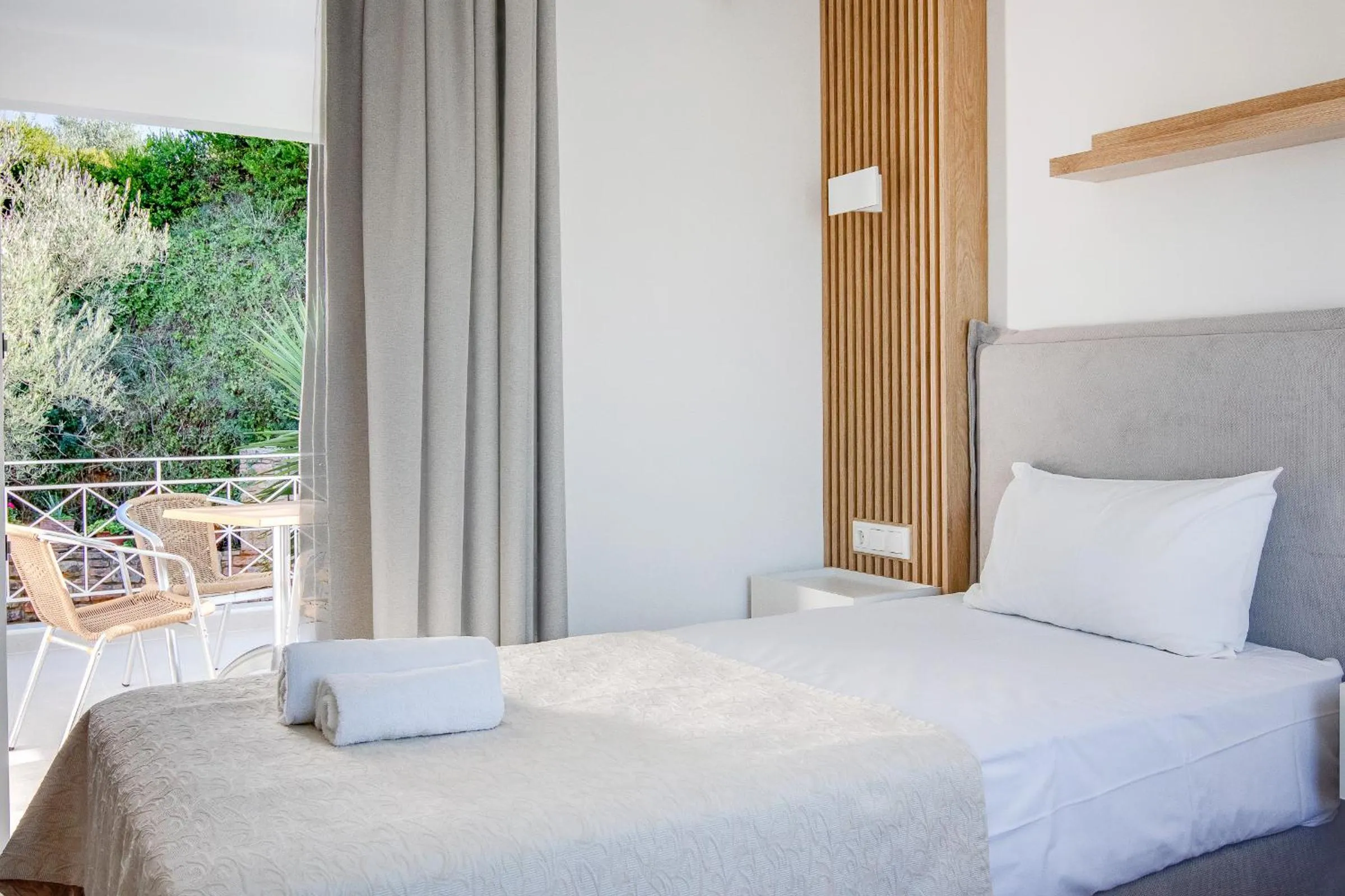 Bed in Peroulia Beach Houses