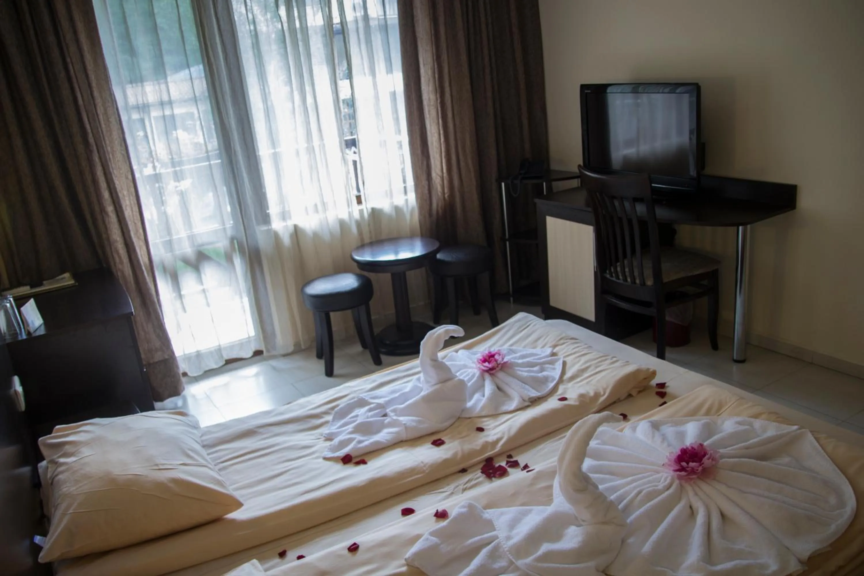 Bed in Family Hotel Delta