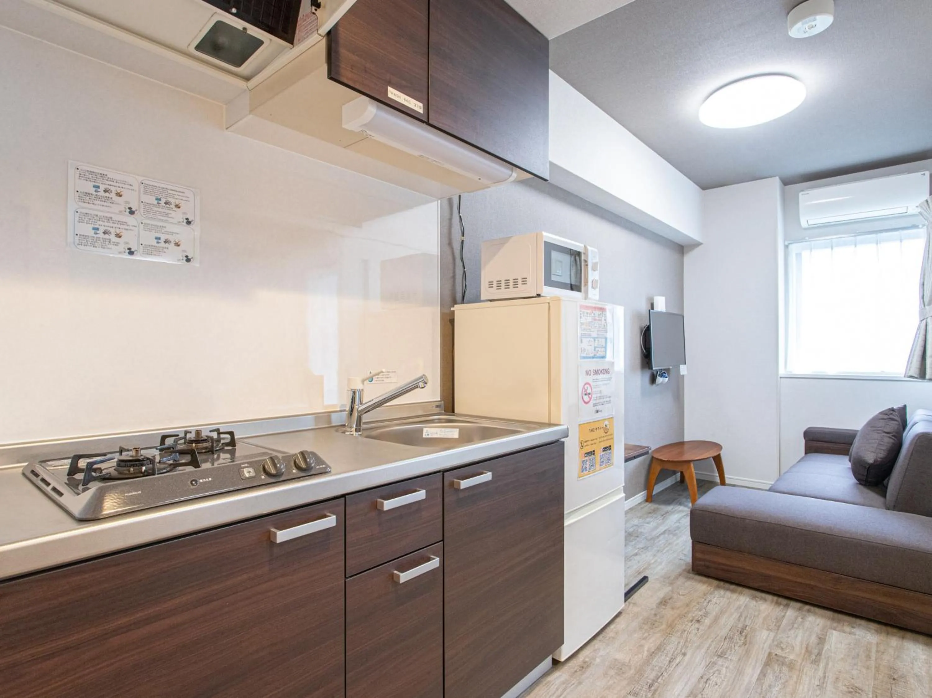 Kitchen or kitchenette in Dream Inn Hakata