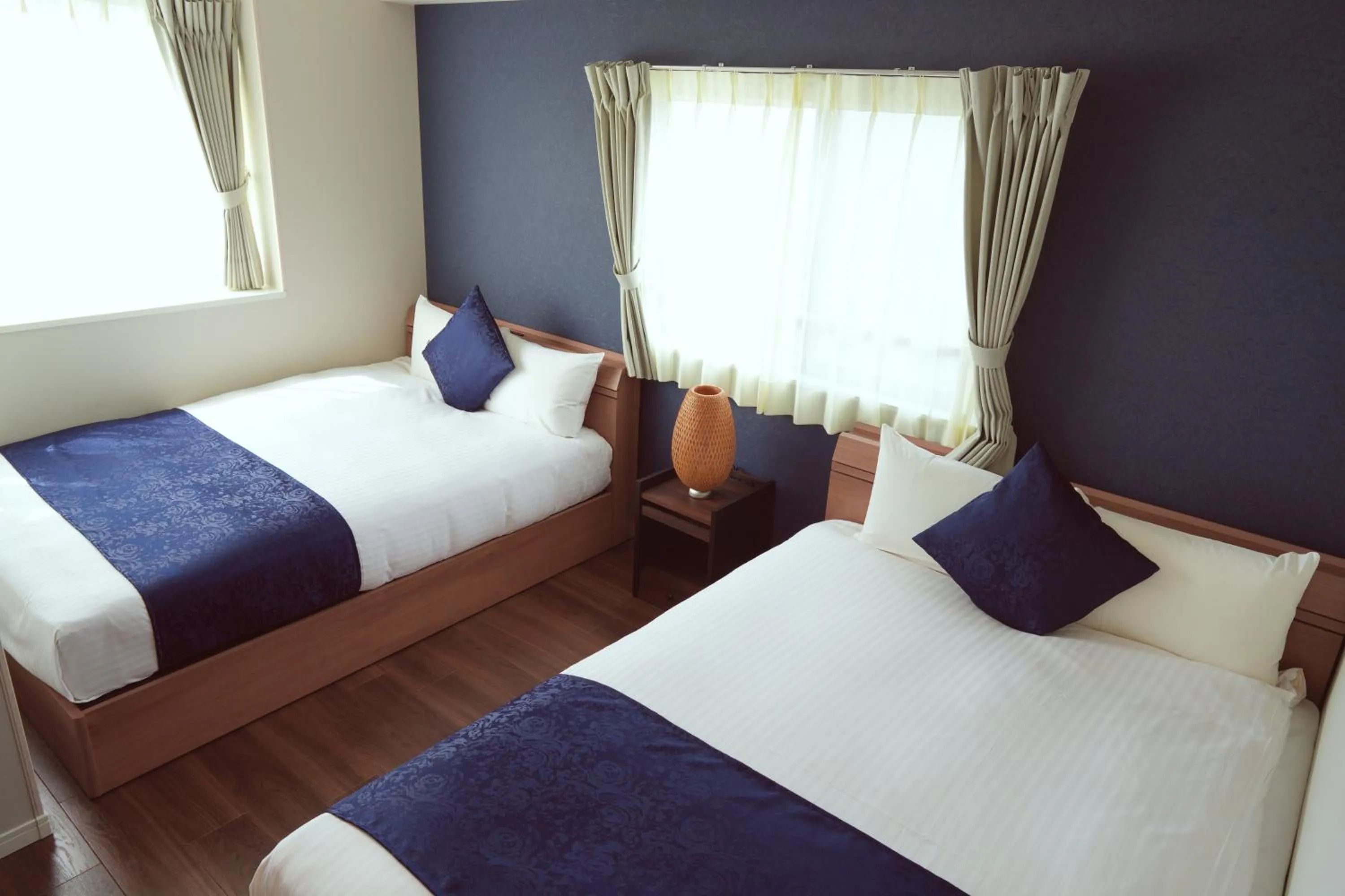 Bed in Dream Inn Hakata