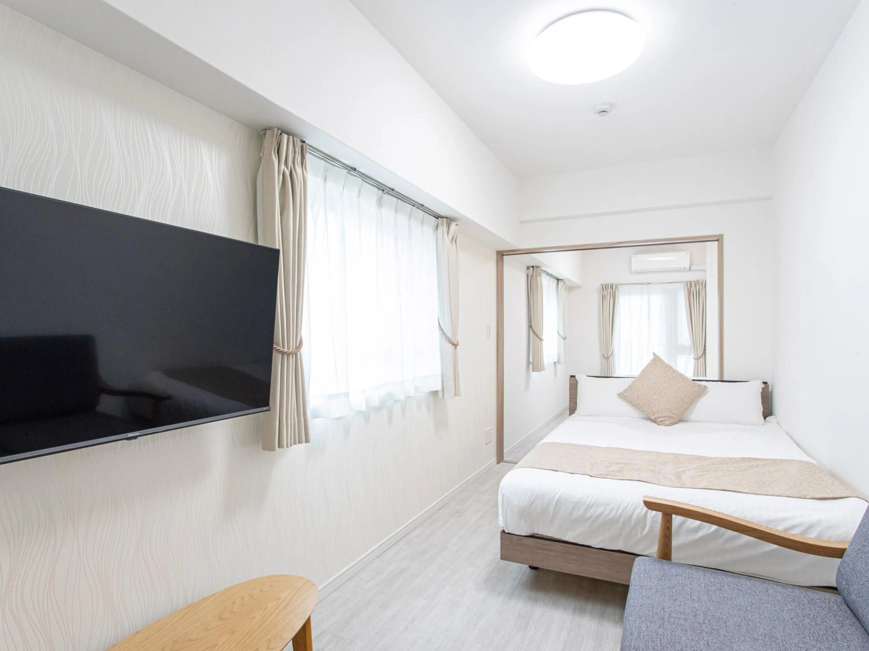 Photo of the whole room, Bed in Dream Inn Hakata