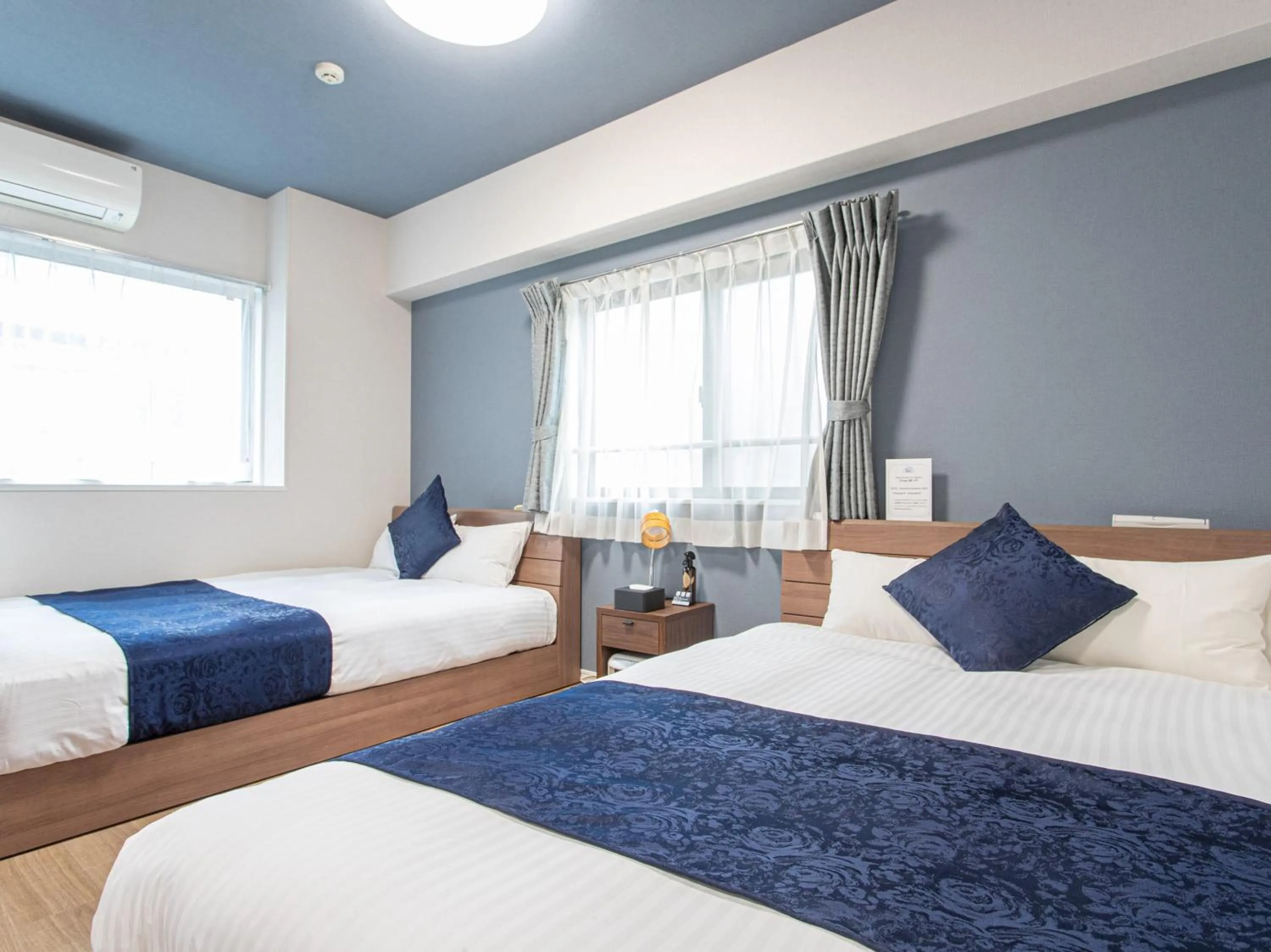 Bed in Dream Inn Hakata