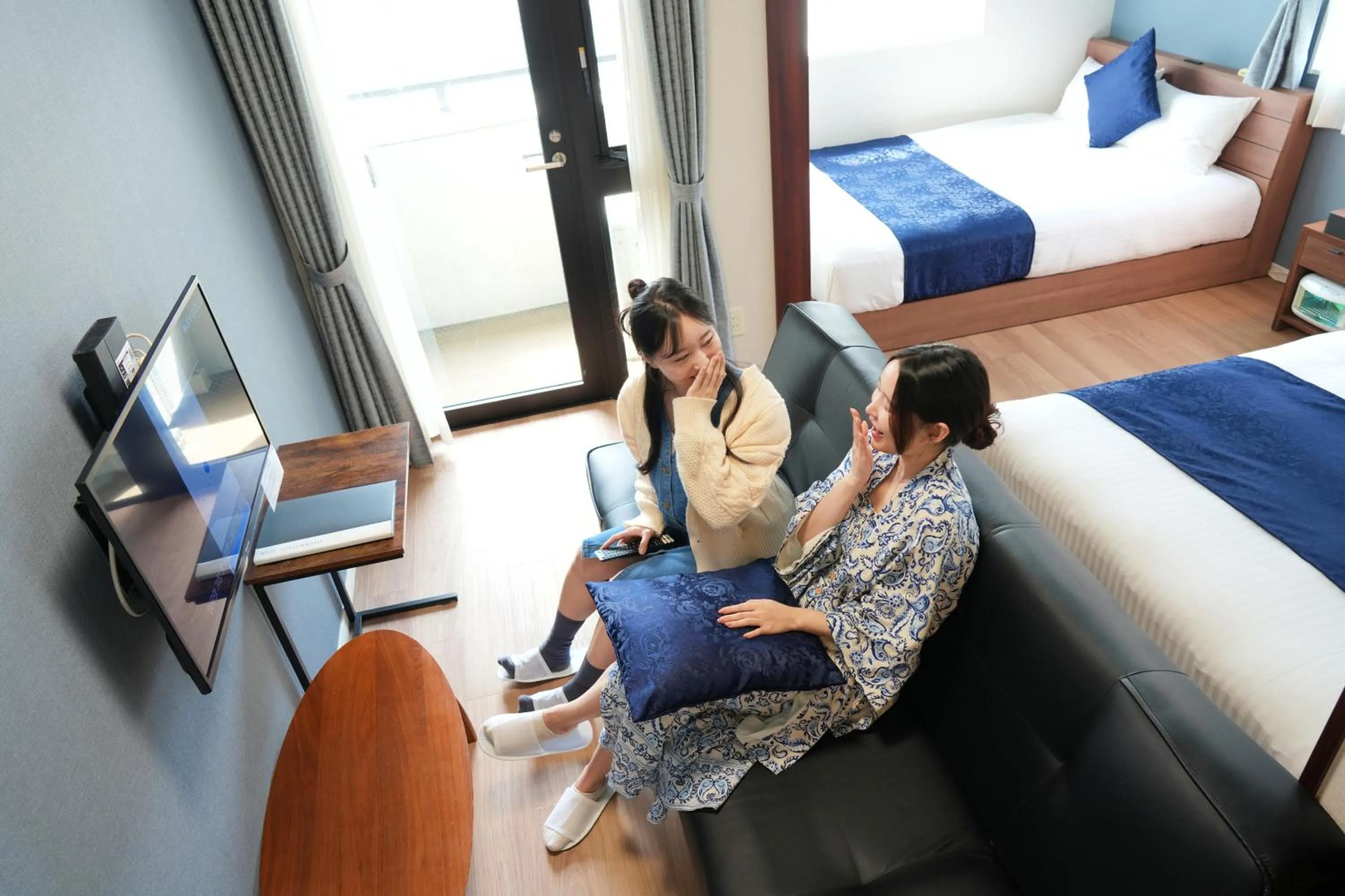 Bed in Dream Inn Hakata