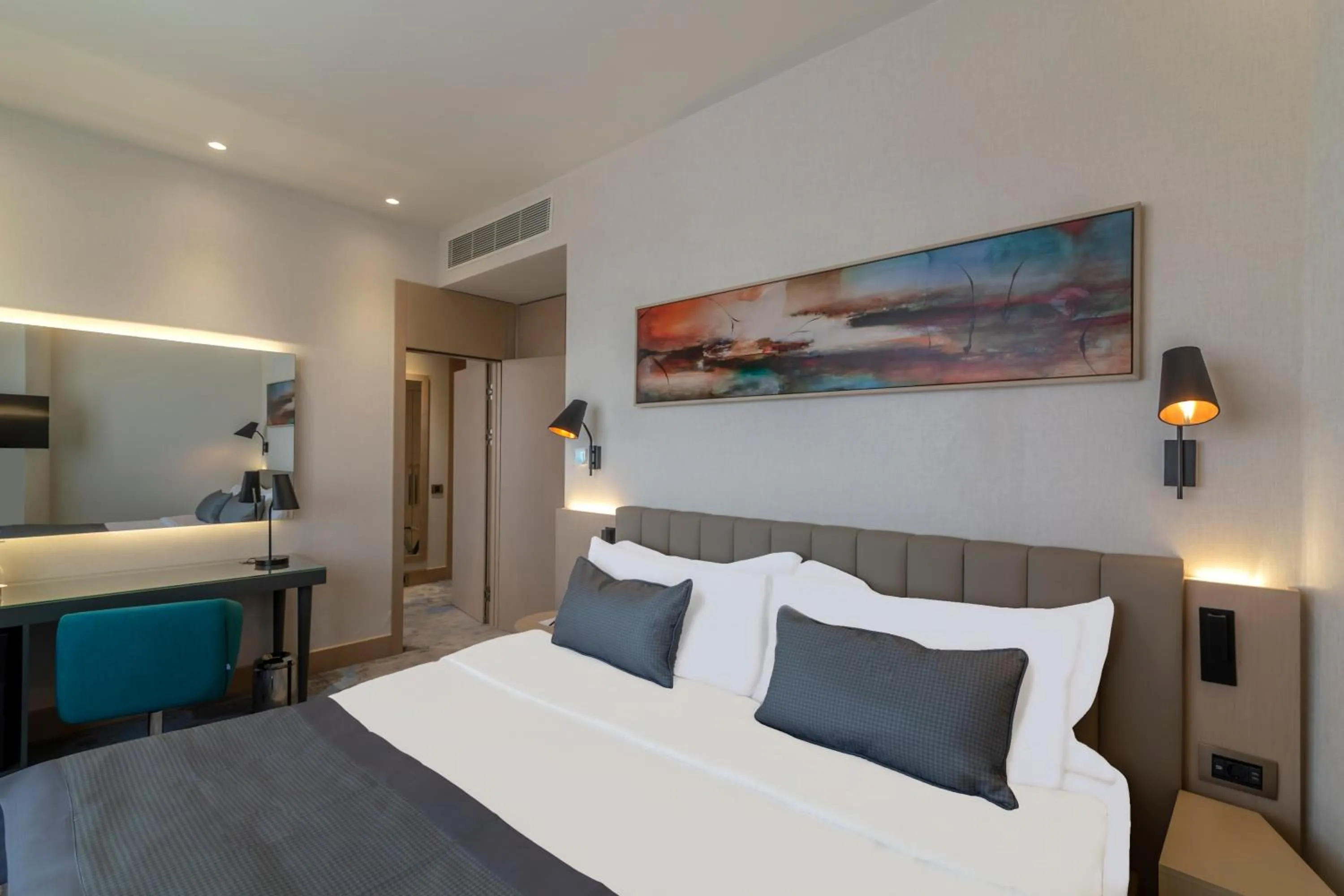 Photo of the whole room, Bed in Crowne Plaza Cappadocia - Nevsehir by IHG