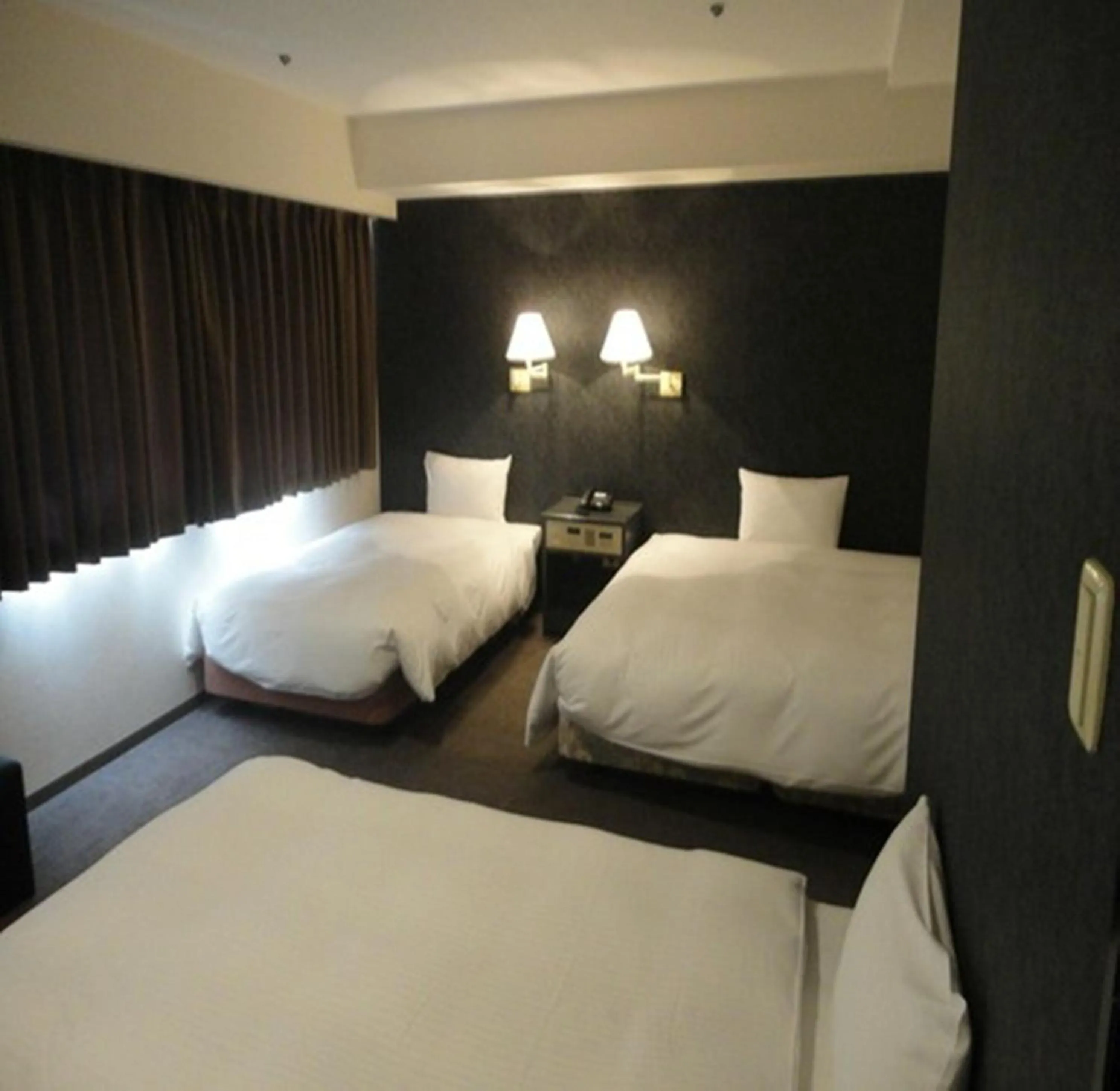 Photo of the whole room, Bed in Green Rich Hotel Nishitetsu Ohashi Ekimae