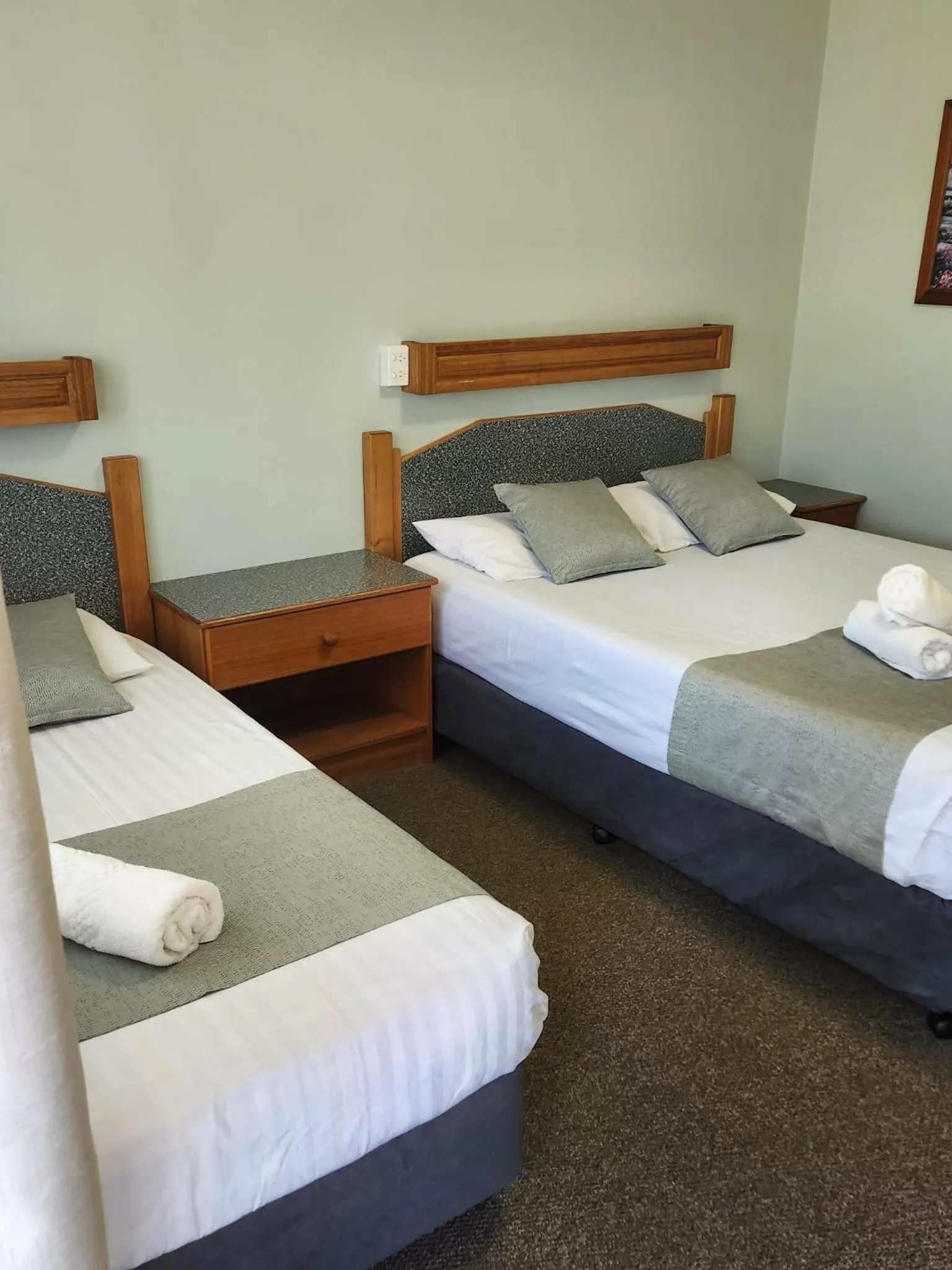 Bed in Bucketts Way Motel Gloucester