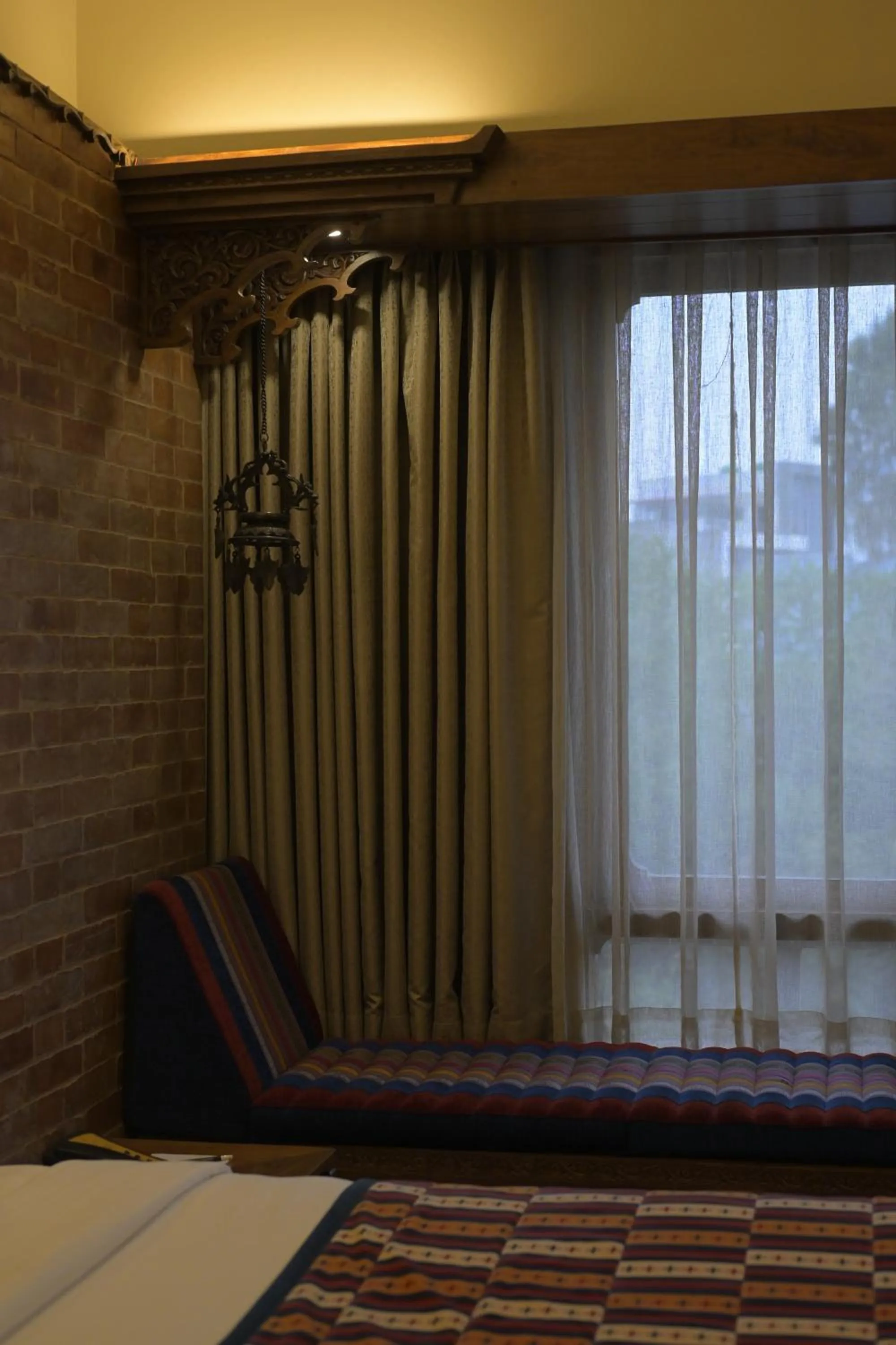 Seating area, Bed in Hotel Yak & Yeti