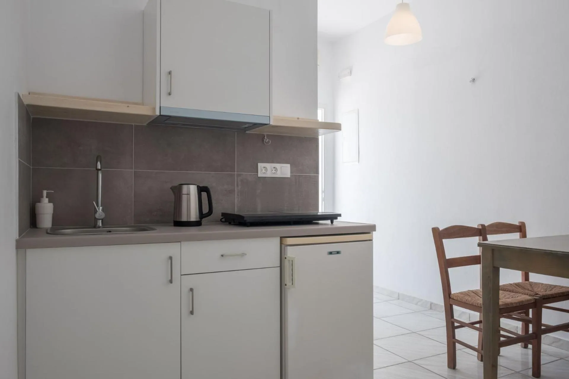 Dining area in Paradise Apartments Studios