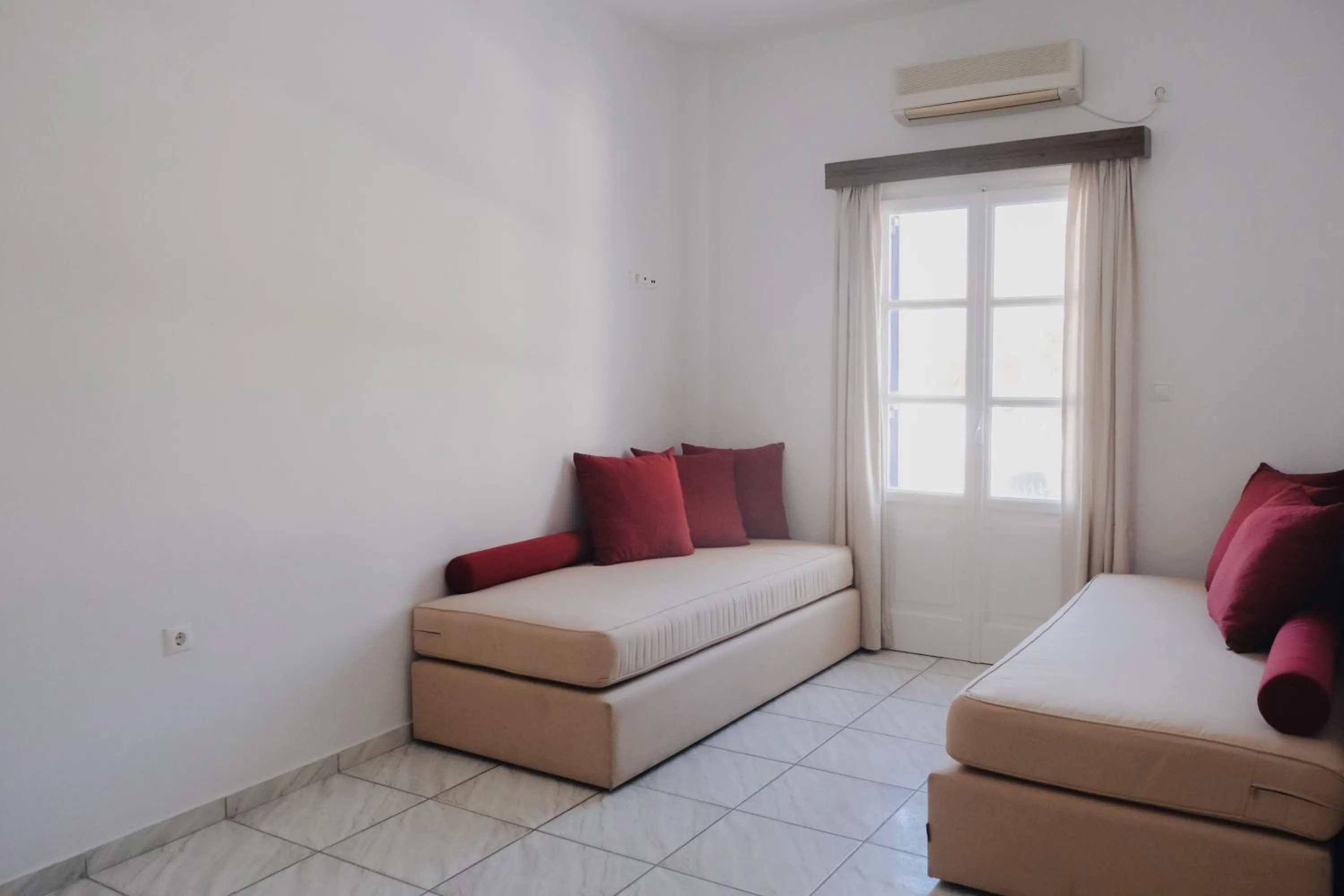 Bed in Paradise Apartments Studios