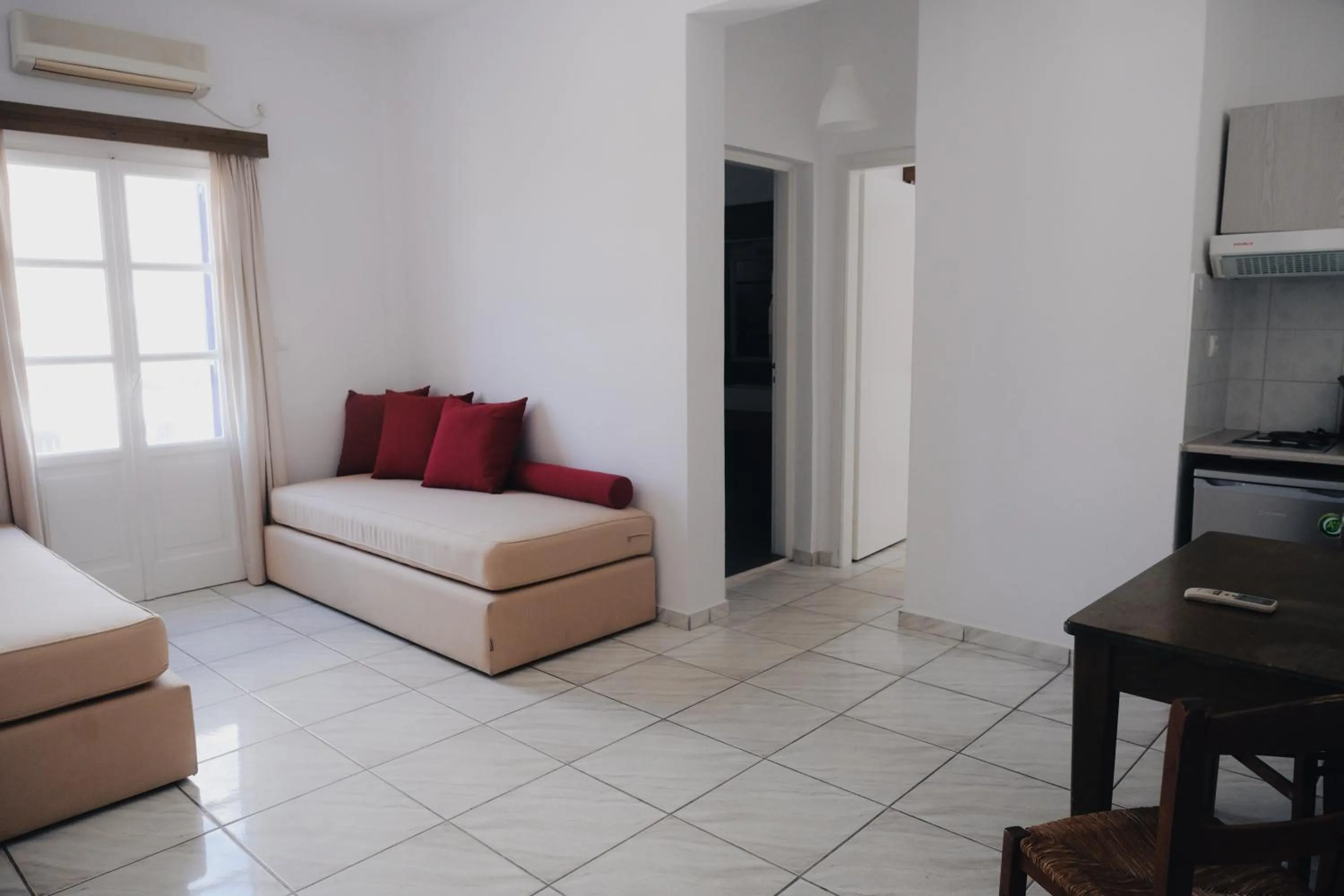 Bed in Paradise Apartments Studios