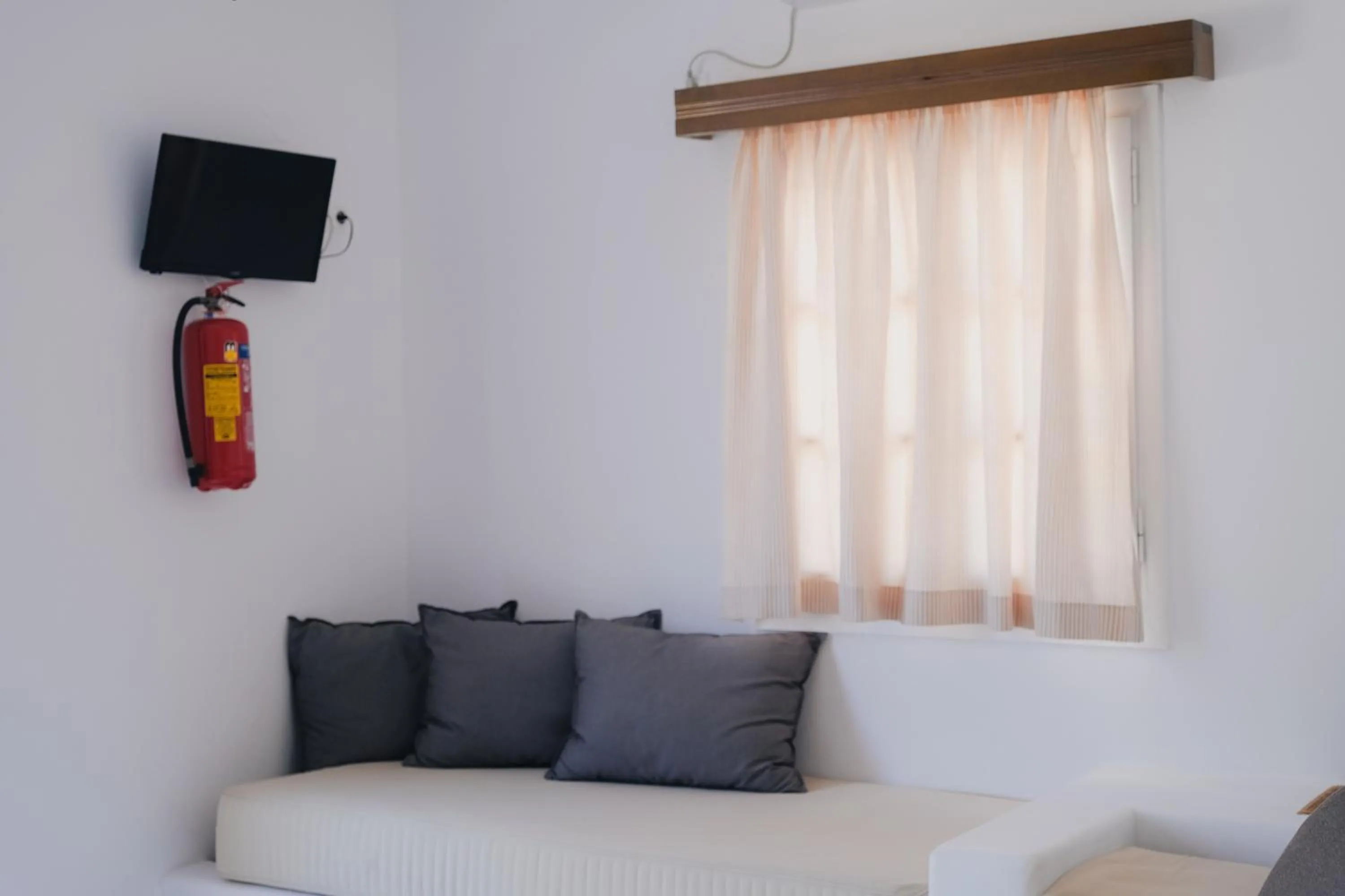 Bed in Paradise Apartments Studios