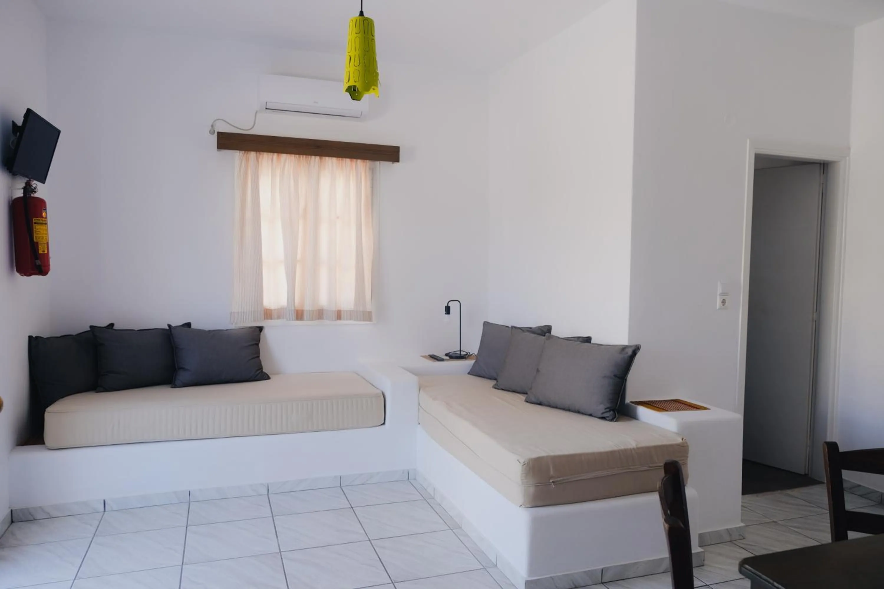 Bed in Paradise Apartments Studios