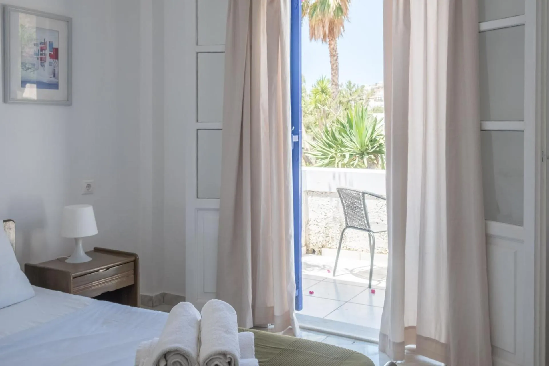 Bed in Paradise Apartments Studios