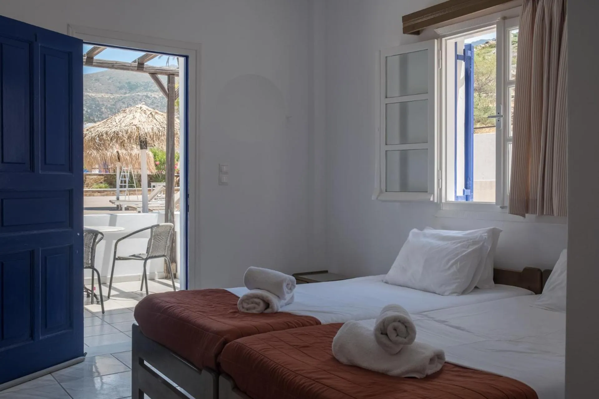 Bed in Paradise Apartments Studios