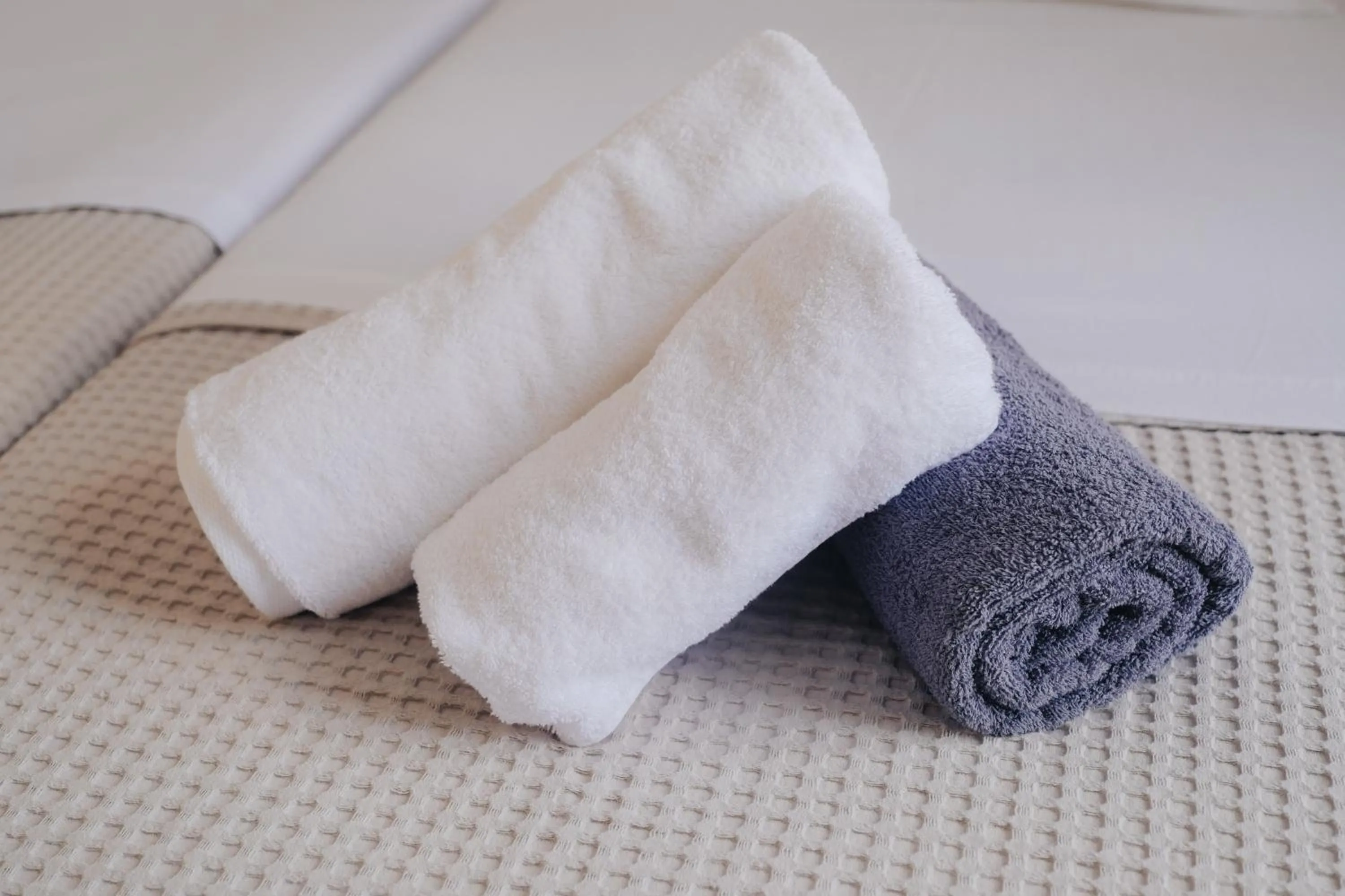 Bed in Paradise Apartments Studios