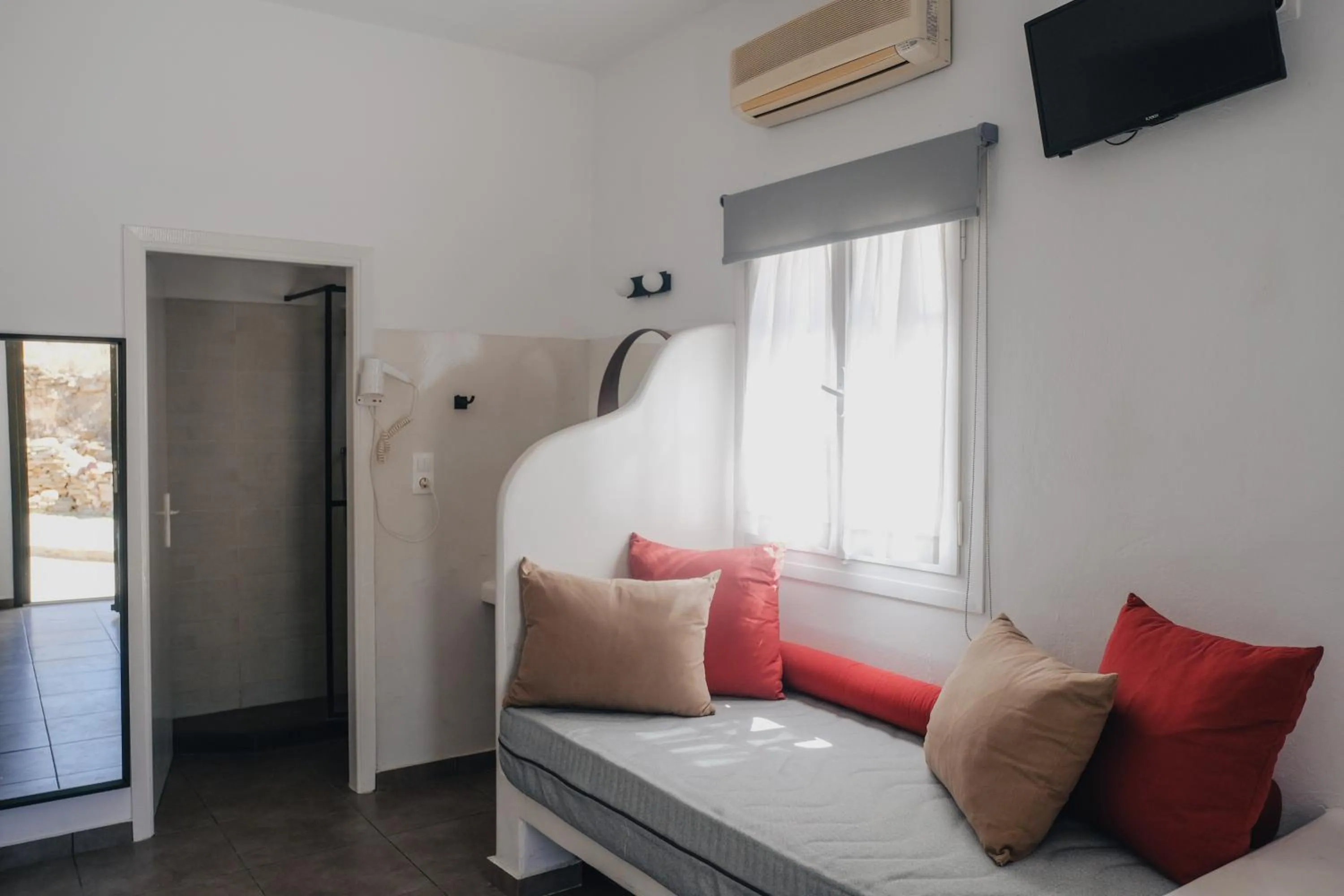 Bed in Paradise Apartments Studios