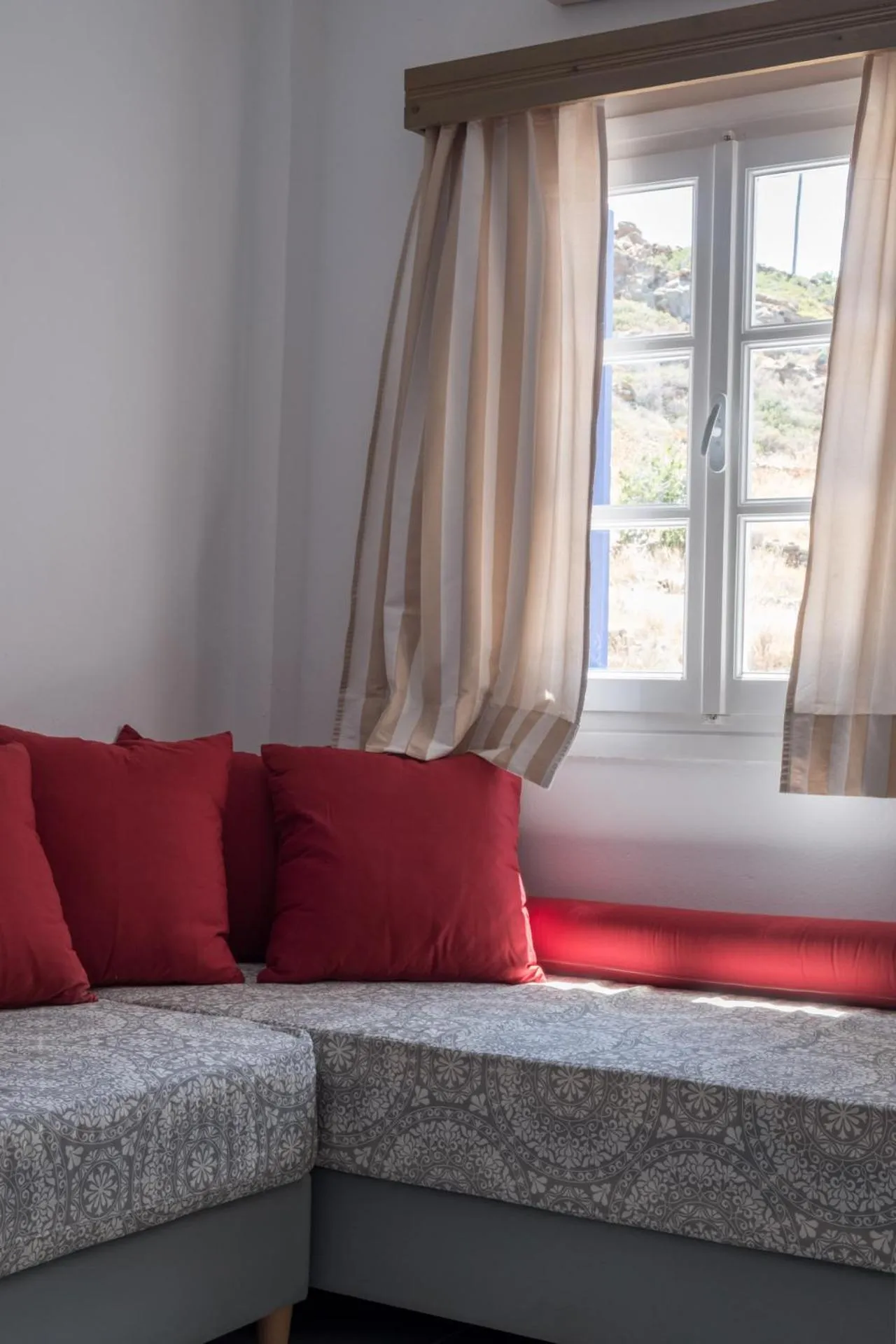 Living room, Bed in Paradise Apartments Studios