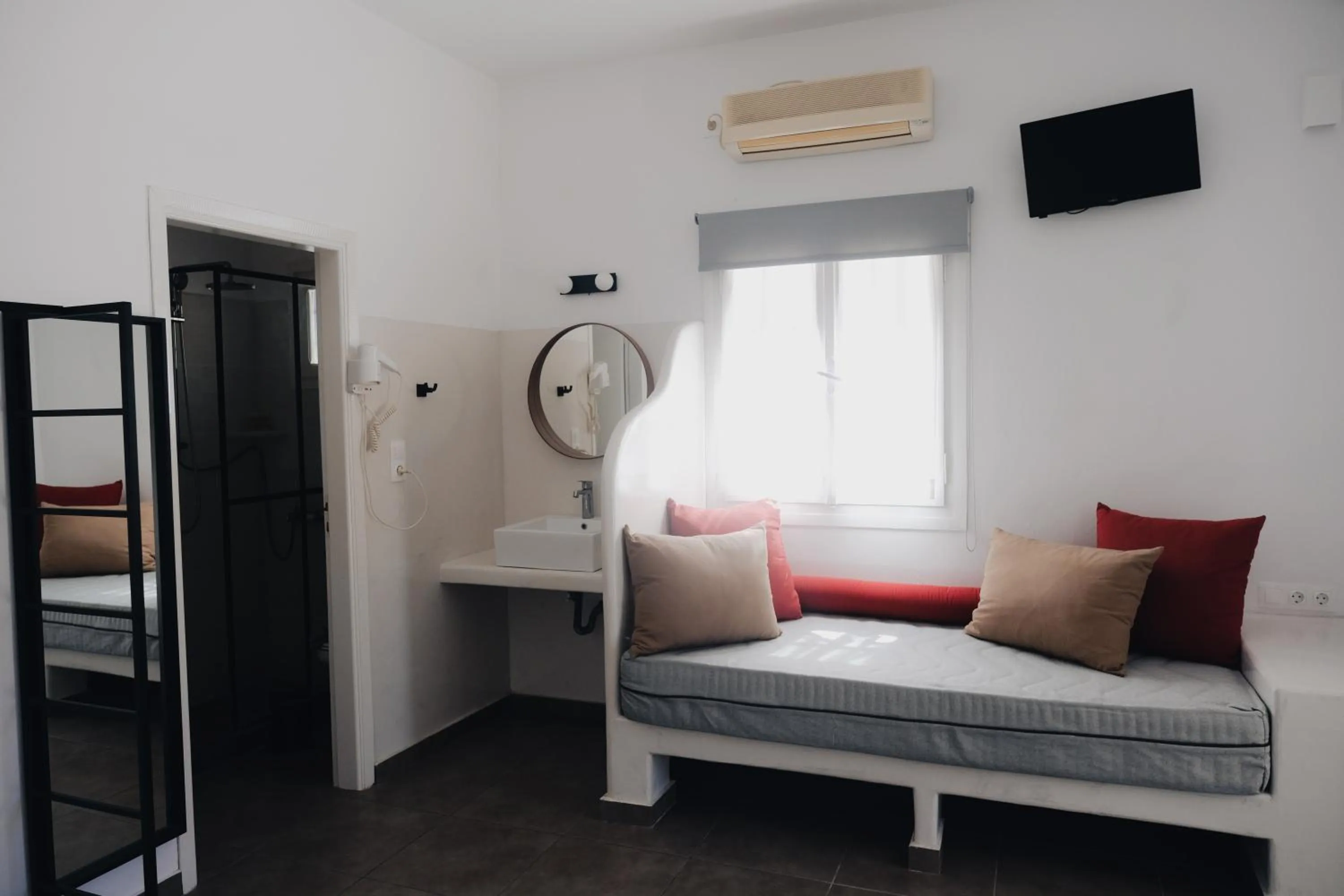 Bed in Paradise Apartments Studios