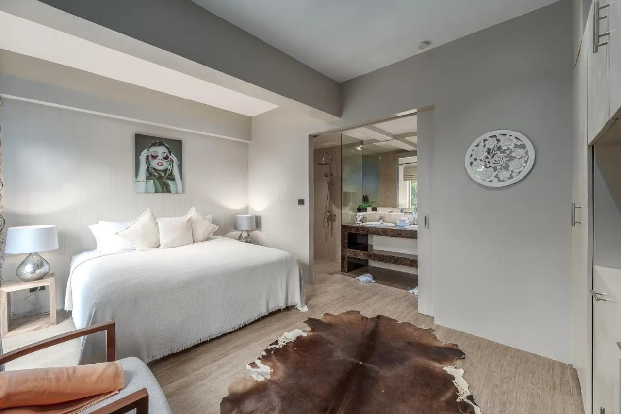 Bed in Baan Phu Prana Boutique Villa