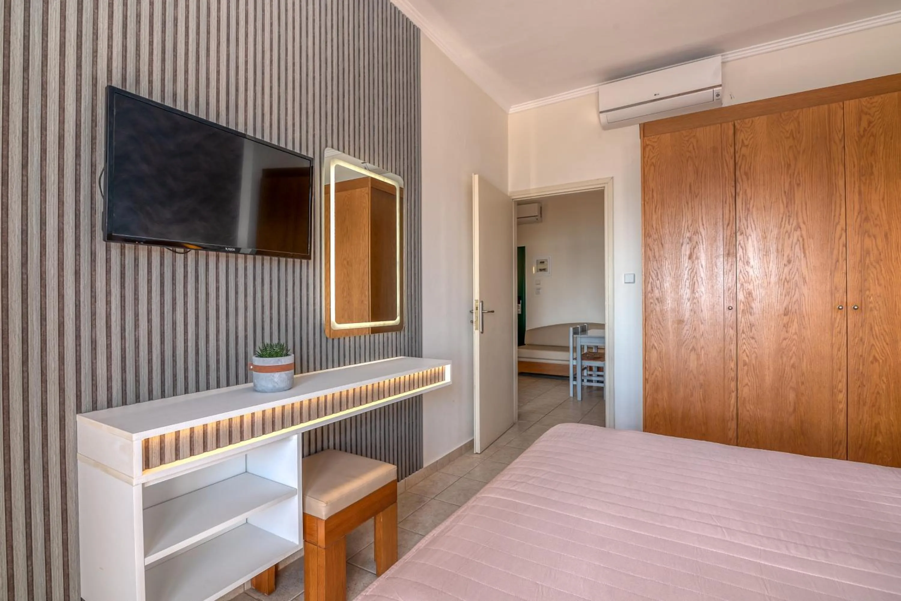 Bed in Christina Beach Hotel