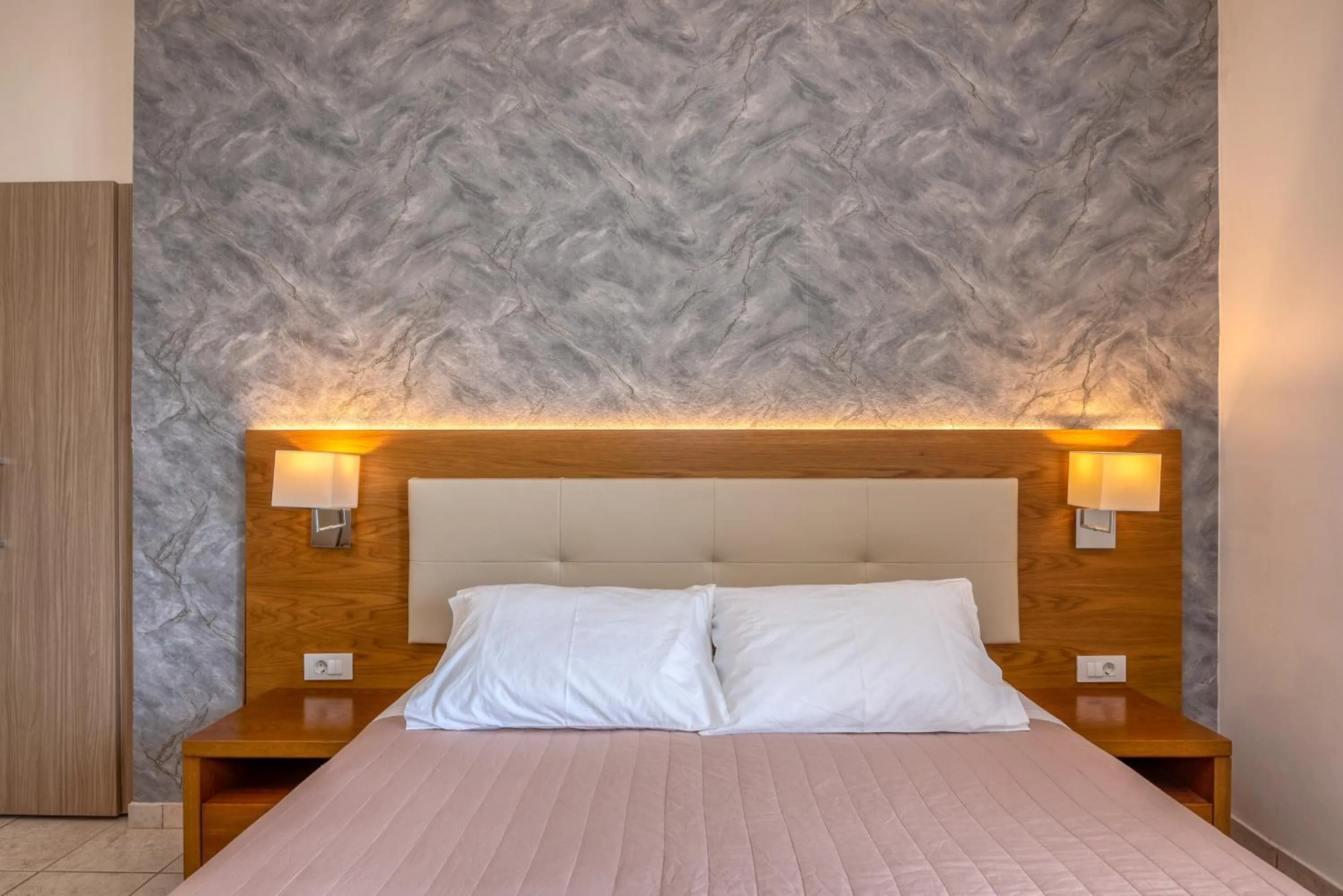 Bed in Christina Beach Hotel