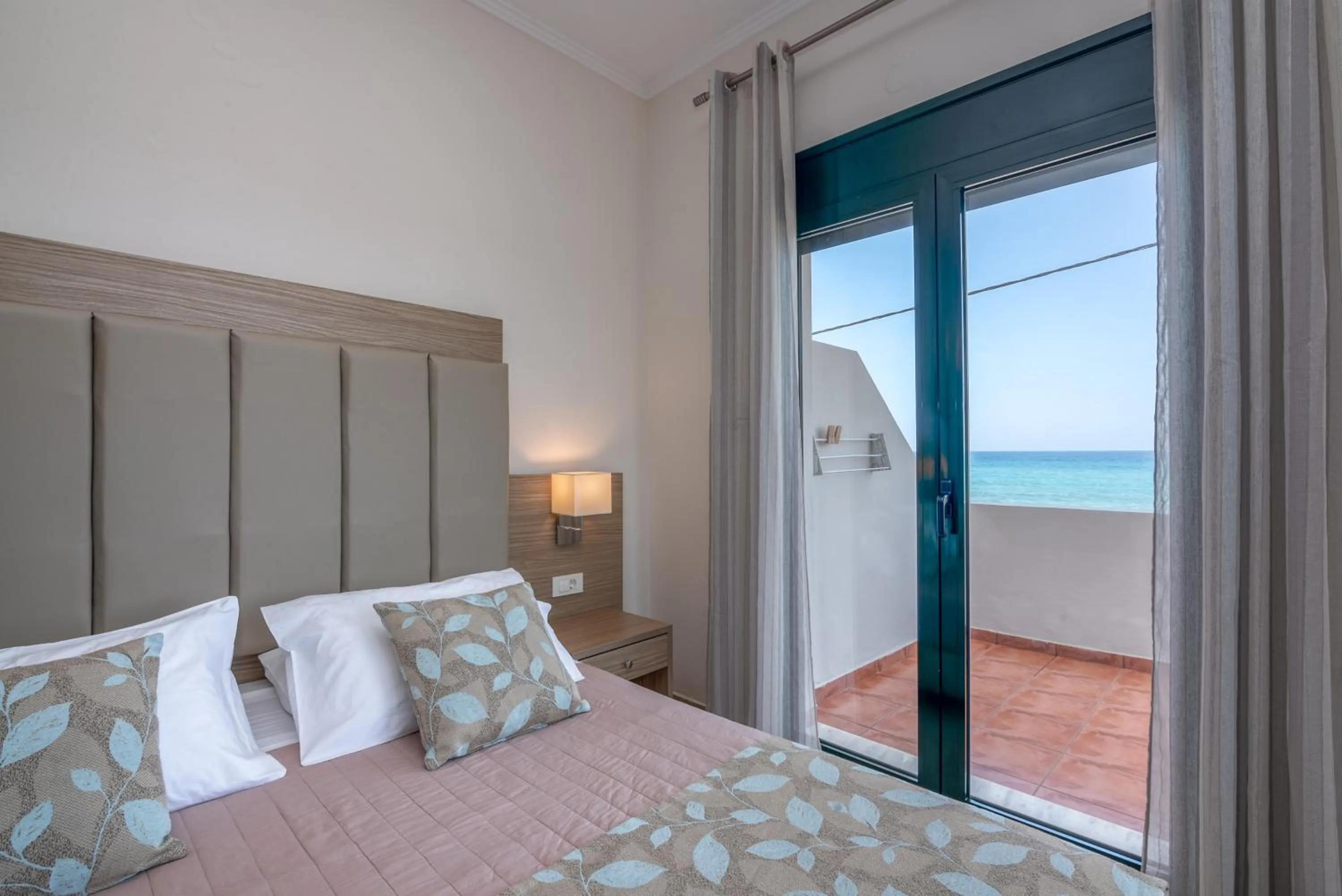 Bed in Christina Beach Hotel